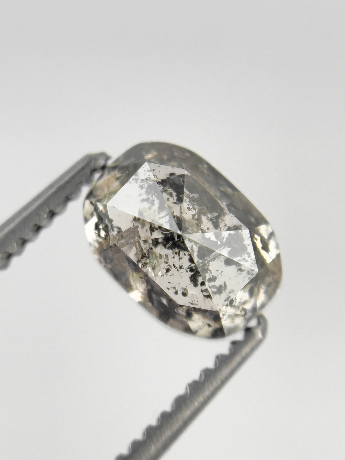 6.8 MM Oval Rose Cut Grey Natural Fancy Diamond