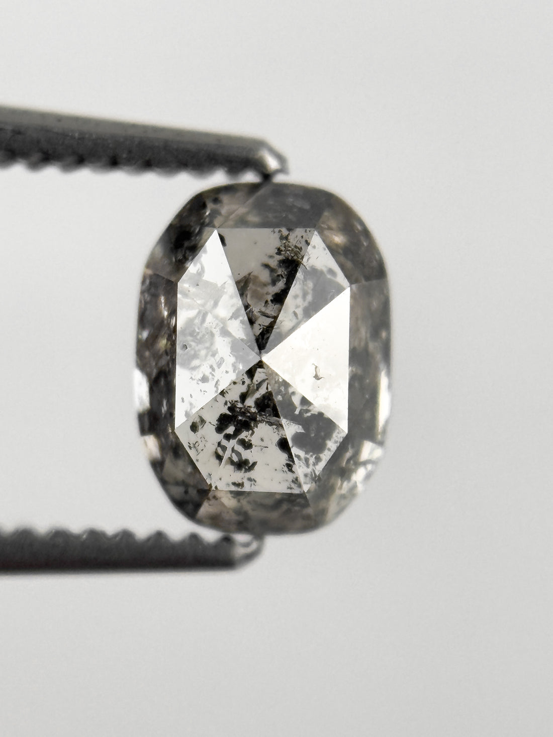 6.8 MM Oval Rose Cut Grey Natural Fancy Diamond