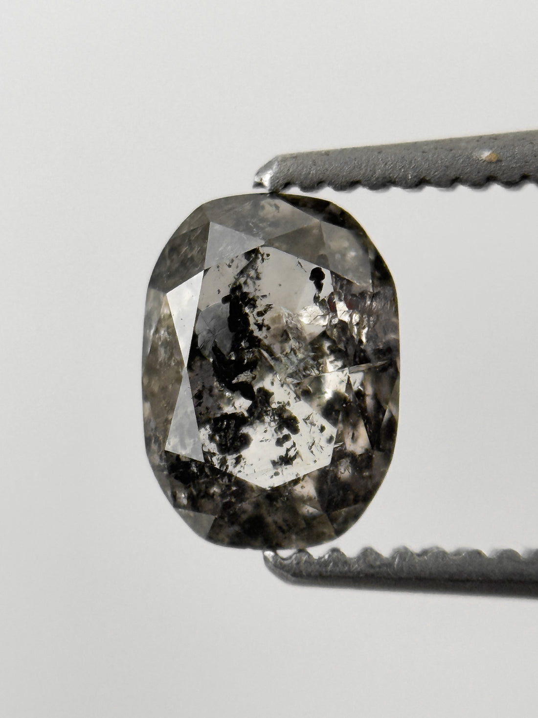 6.8 MM Oval Rose Cut Grey Natural Fancy Diamond