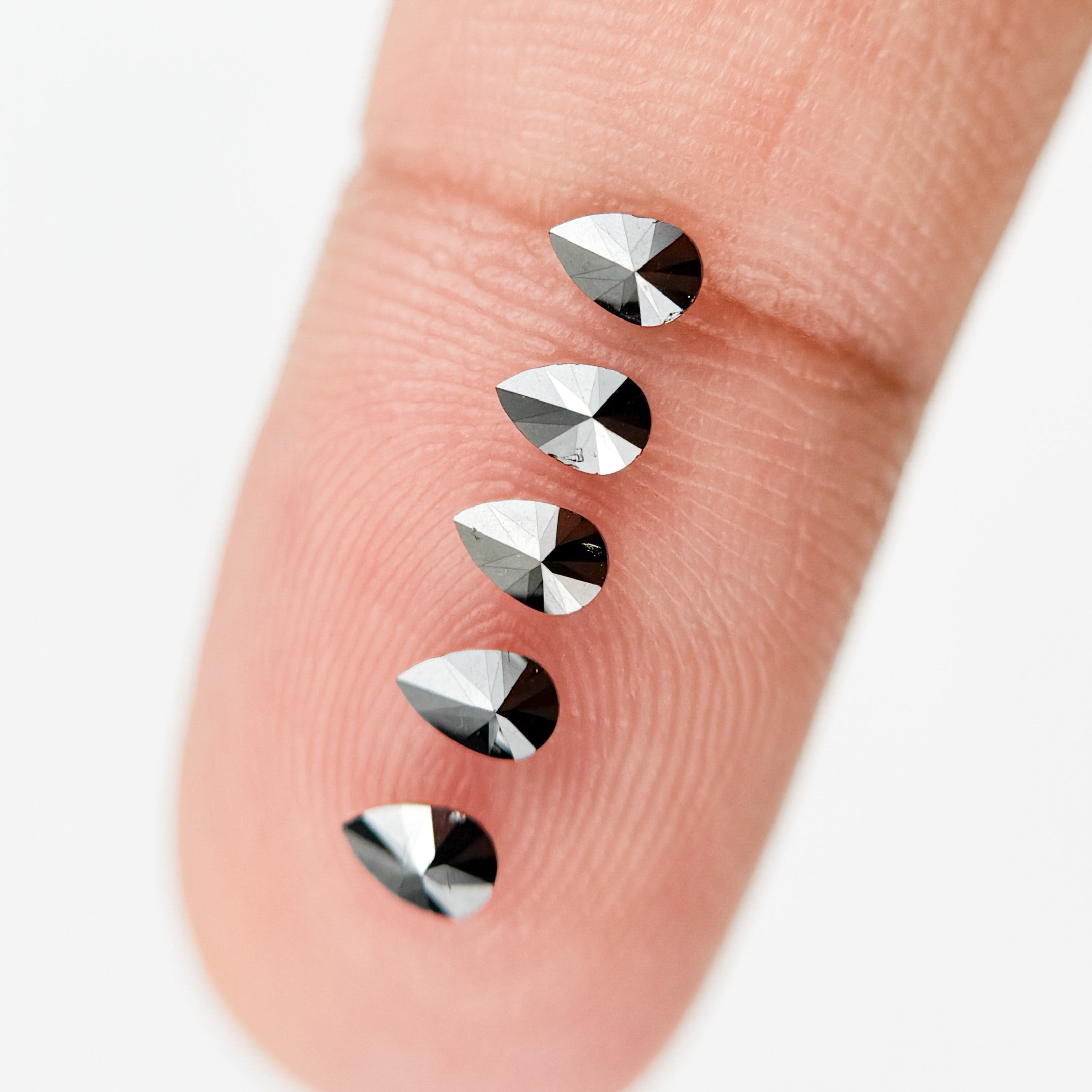 4 MM Pear Brilliant Cut Black Natural Fancy Diamond