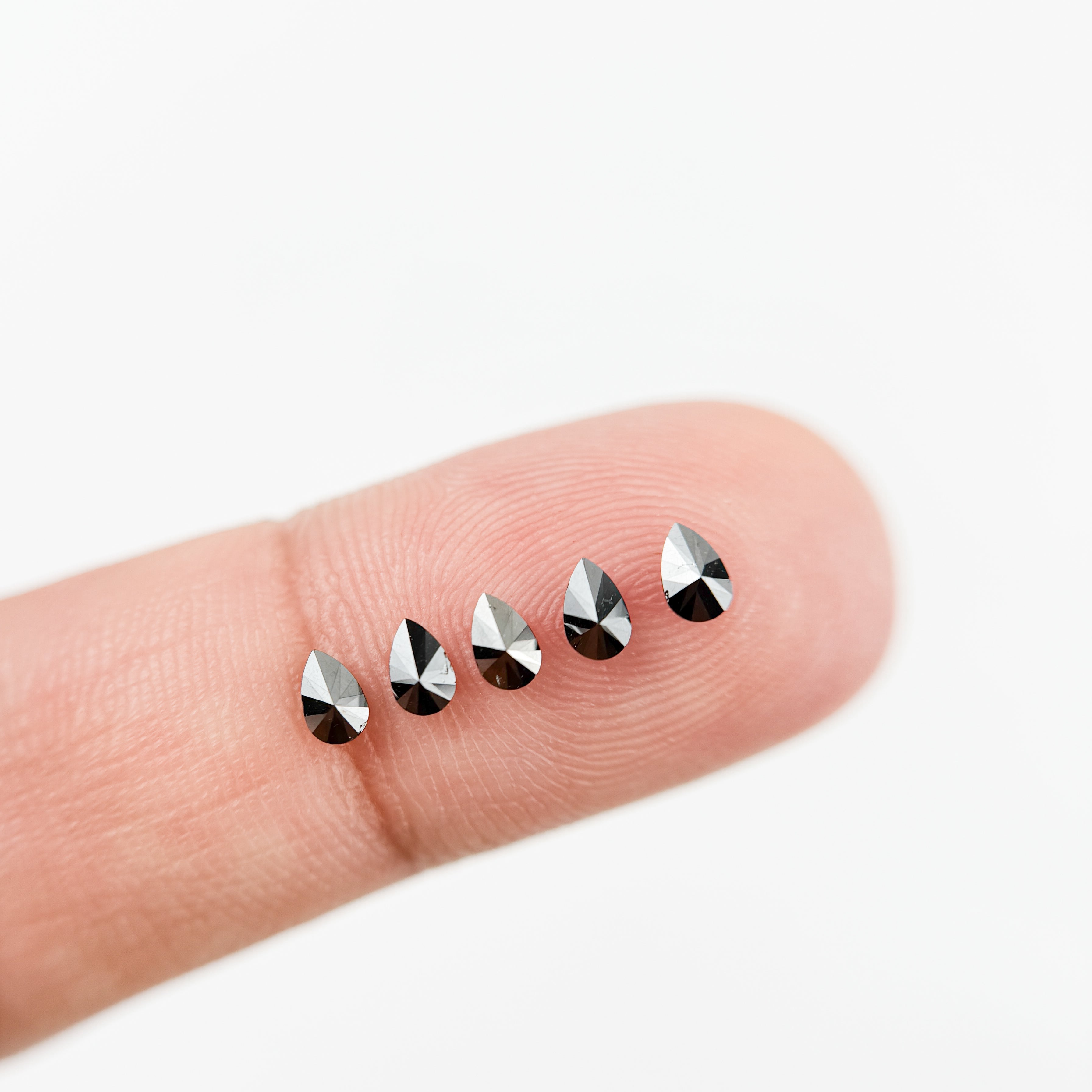 4 MM Pear Brilliant Cut Black Natural Fancy Diamond