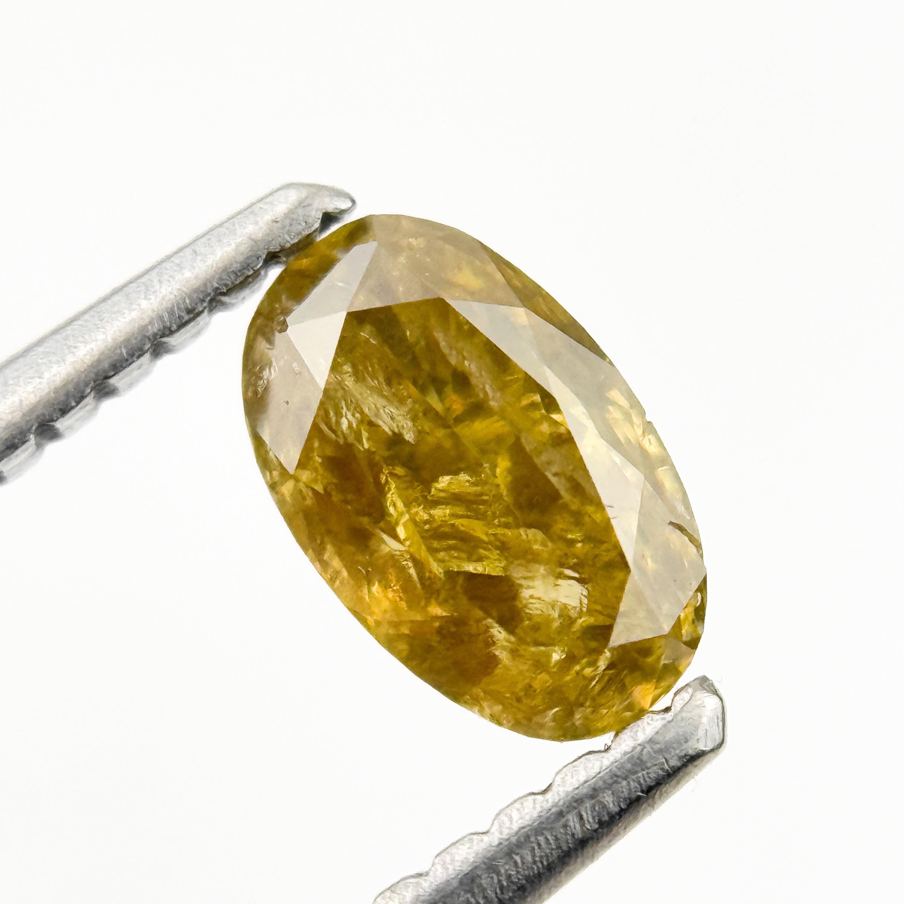 0.67 Ct Oval Rose Cut Yellow Natural Salt and Pepper Diamond