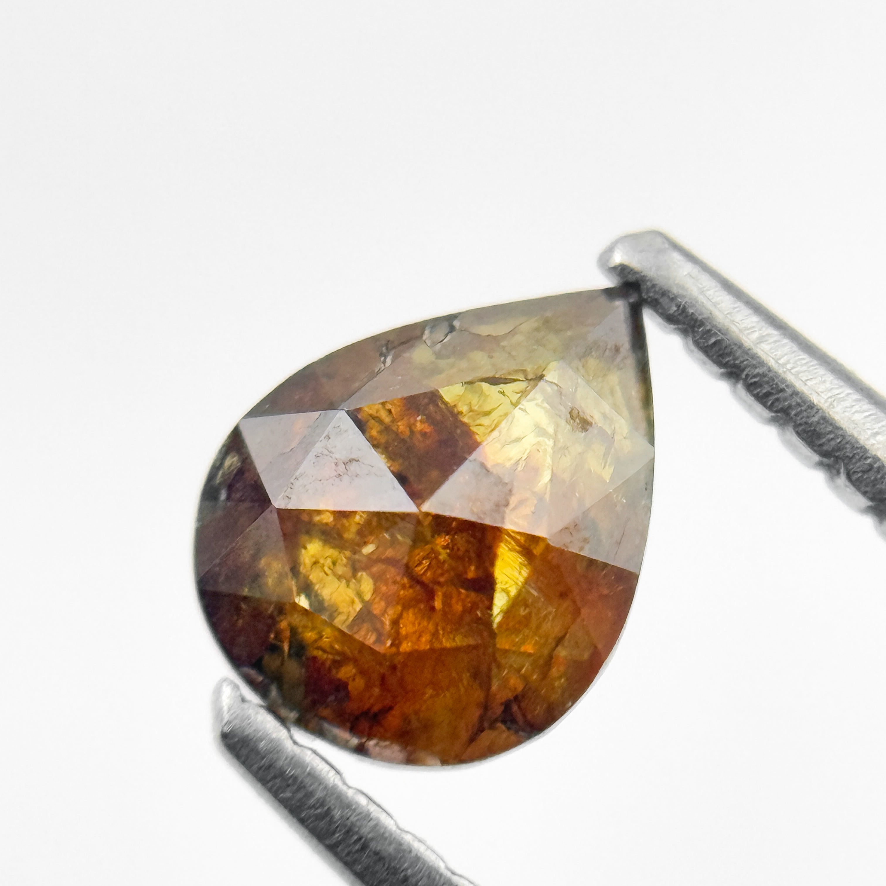 0.80 Ct Pear Rose Cut Red Natural Salt and Pepper Diamond
