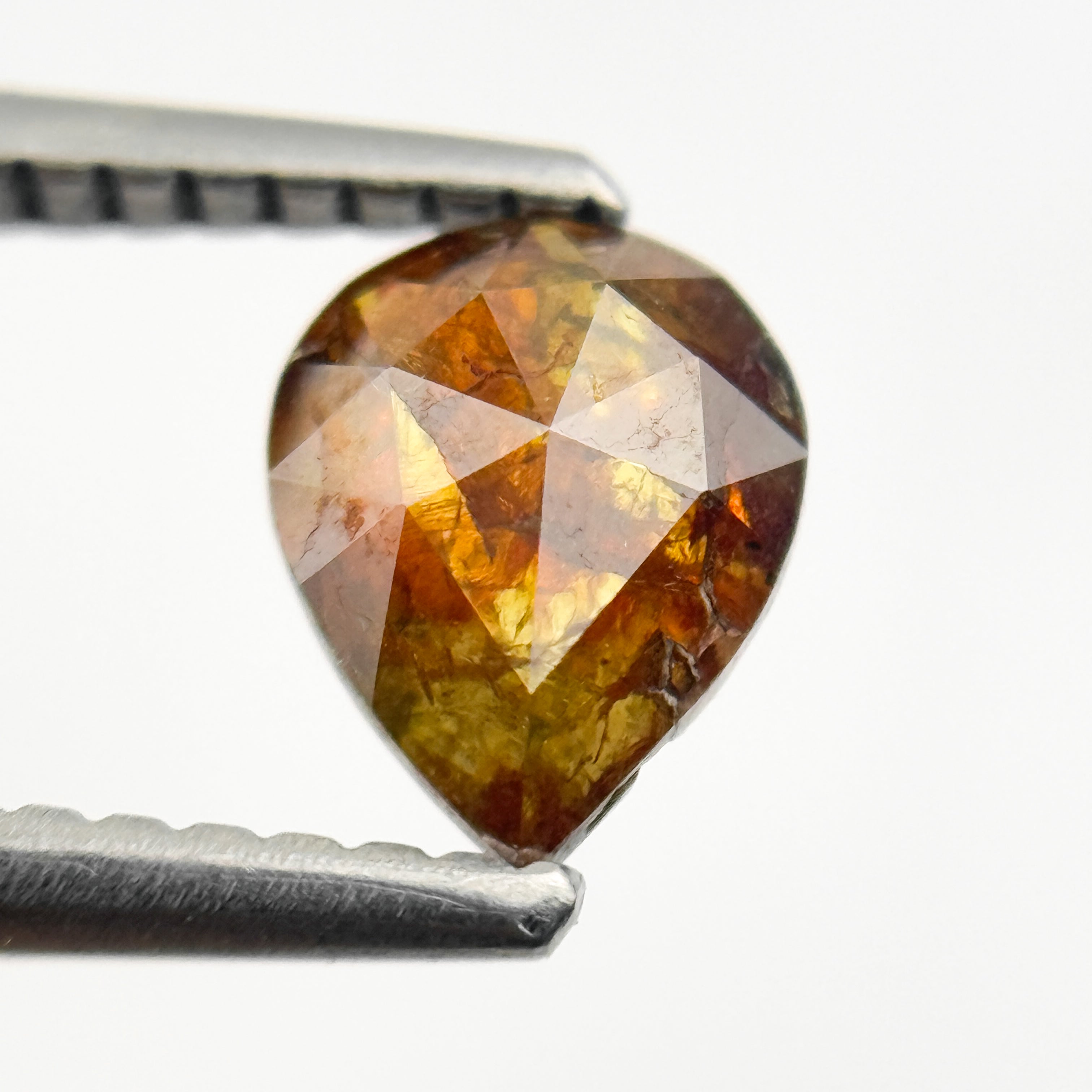 0.80 Ct Pear Rose Cut Red Natural Salt and Pepper Diamond