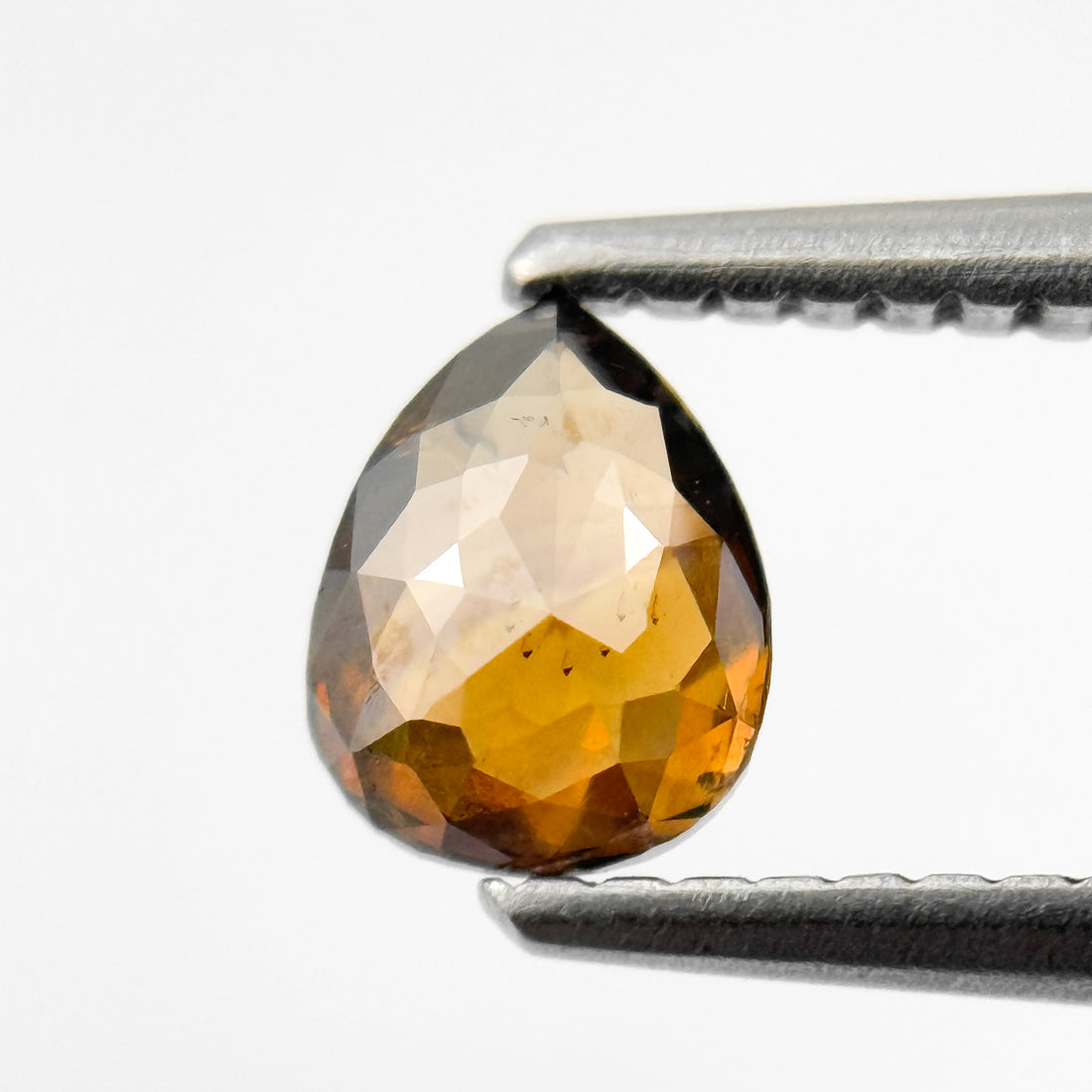 0.59 Ct Pear Rose Cut Orange Natural Salt and Pepper Diamond