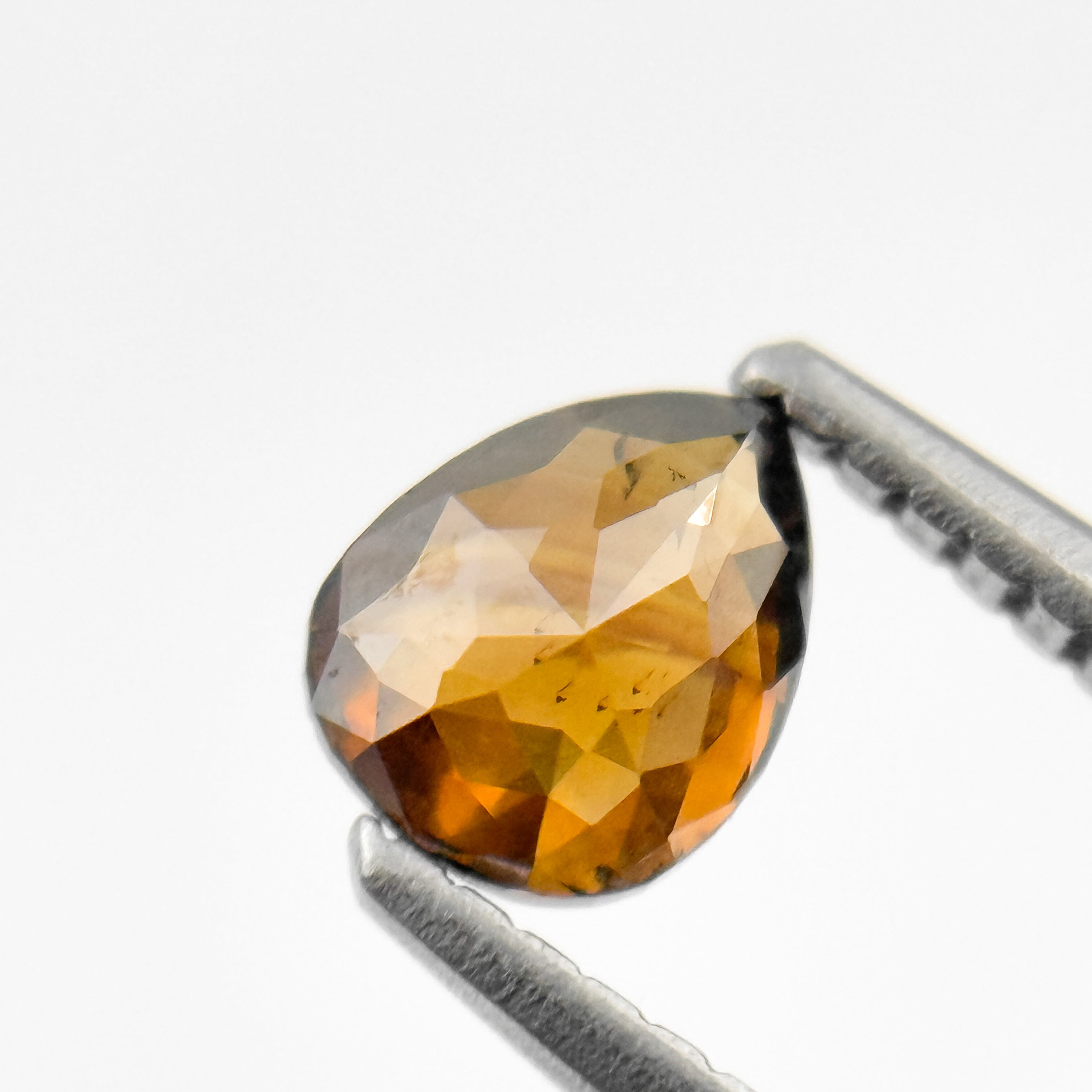 0.59 Ct Pear Rose Cut Orange Natural Salt and Pepper Diamond