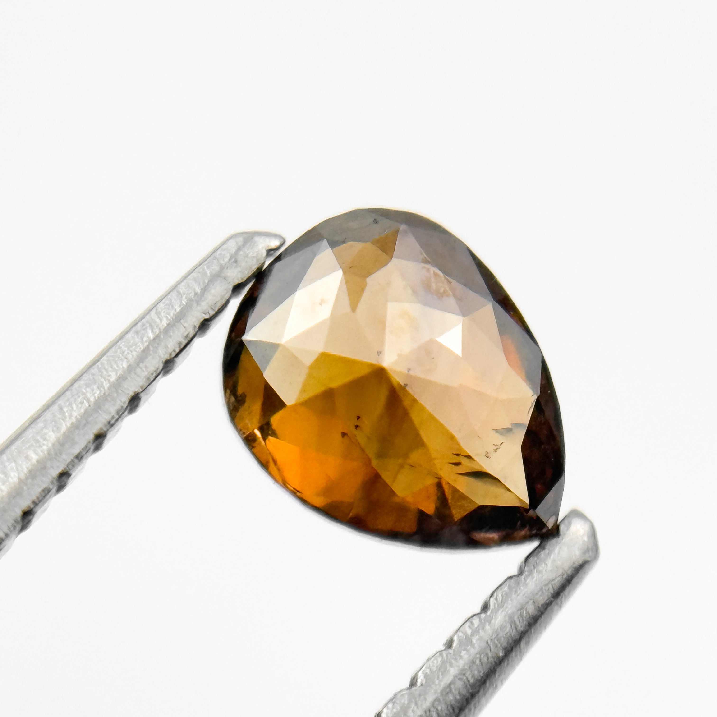 0.59 Ct Pear Rose Cut Orange Natural Salt and Pepper Diamond