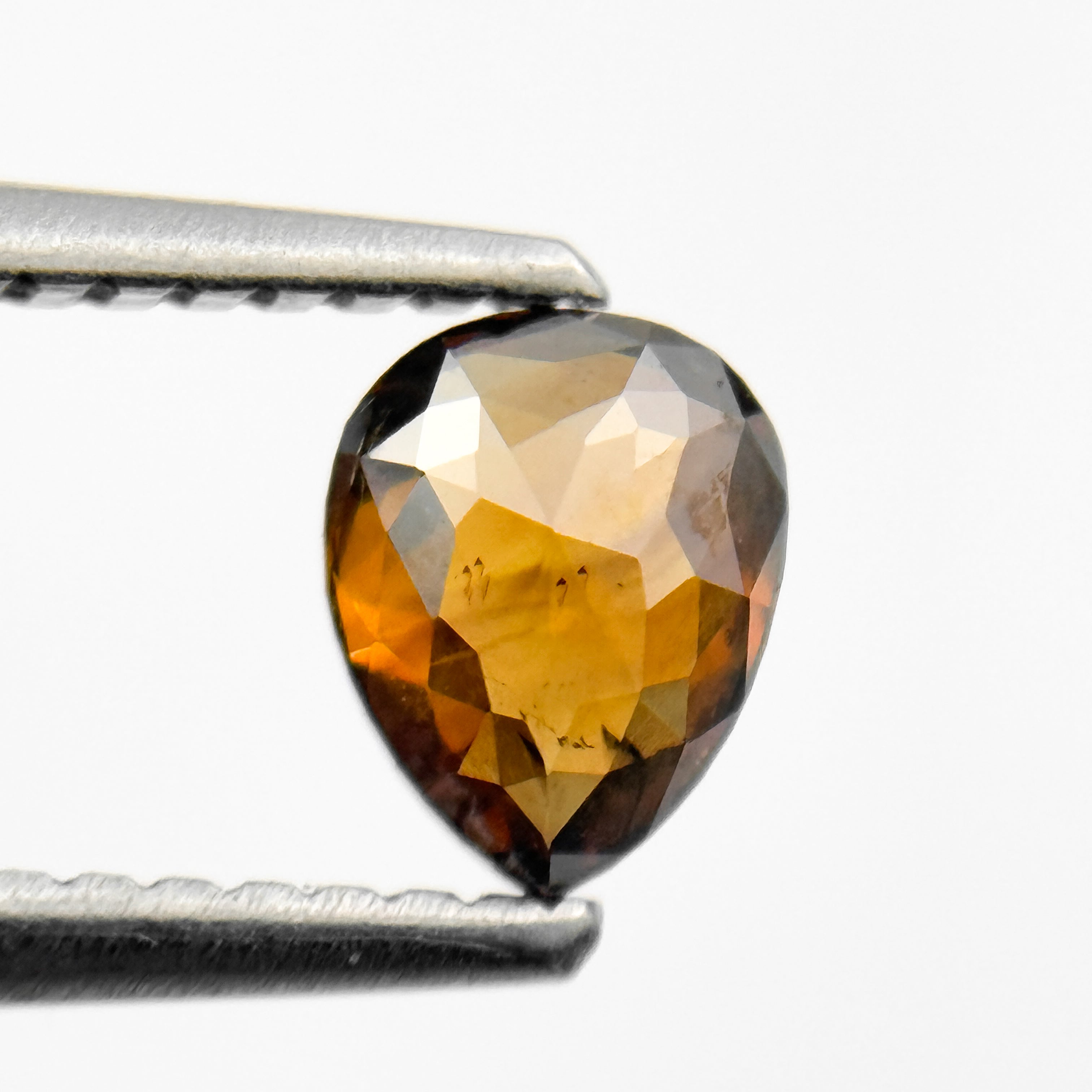 0.59 Ct Pear Rose Cut Orange Natural Salt and Pepper Diamond