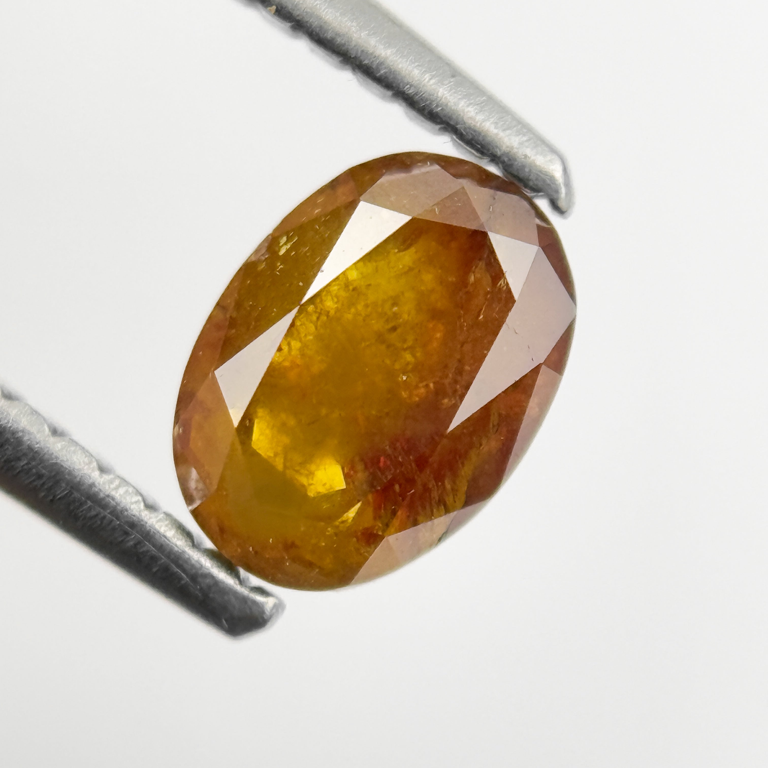 0.72 Ct Oval Rose Cut Red Natural Salt and Pepper Diamond