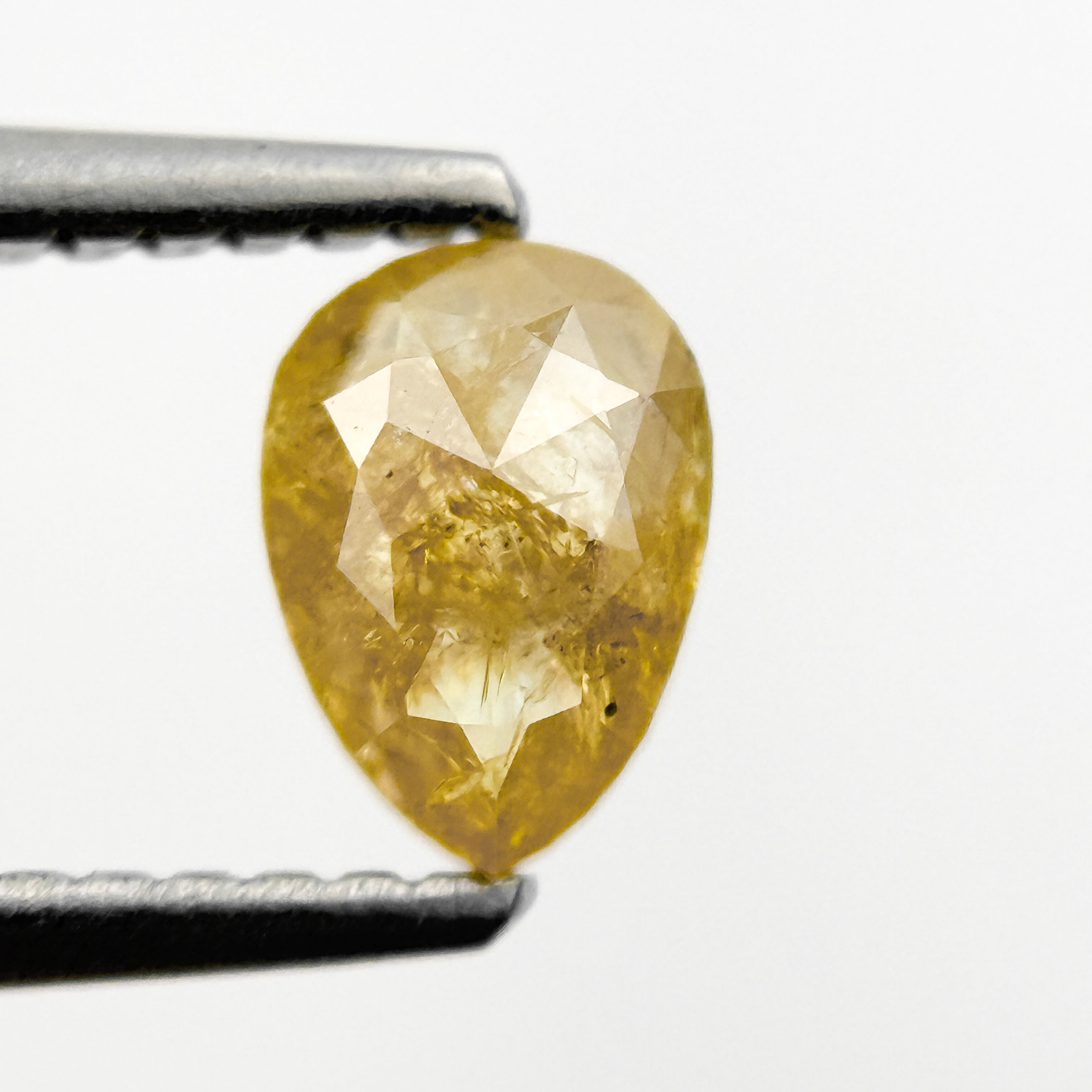 0.75 Ct Pear Rose Cut Yellow Natural Salt and Pepper Diamond