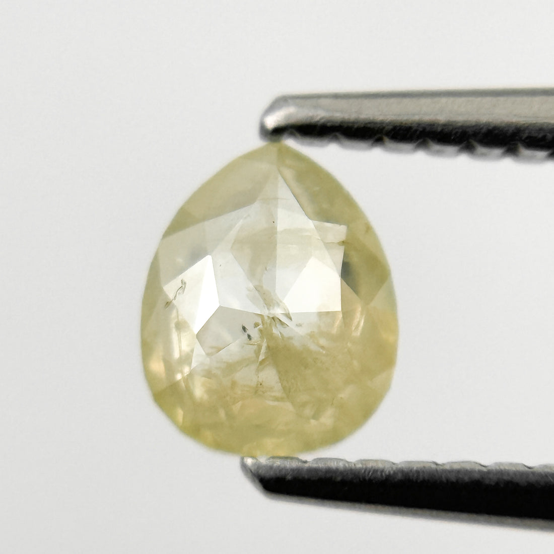 0.67 Ct Pear Rose Cut Yellow Natural Salt and Pepper Diamond