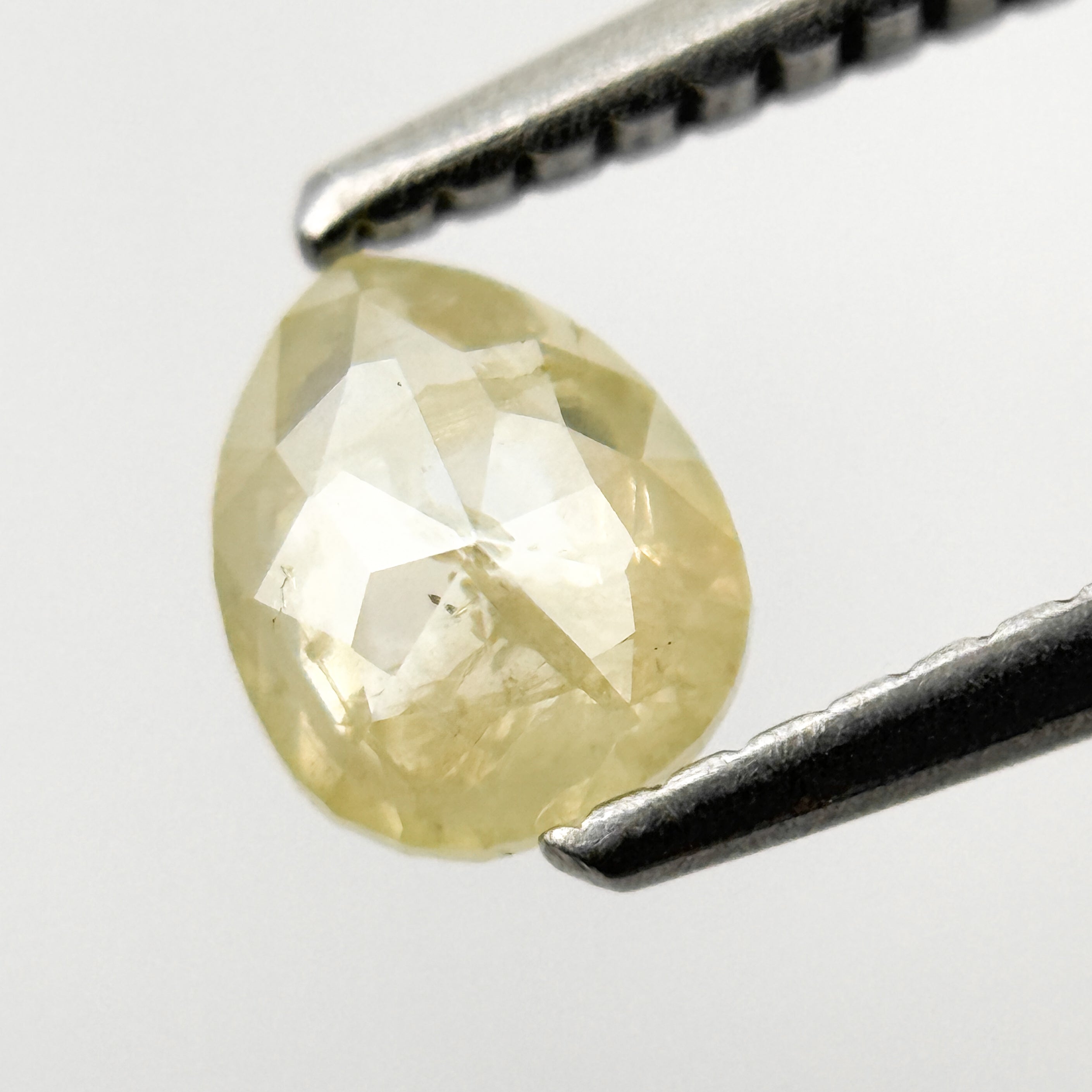 0.67 Ct Pear Rose Cut Yellow Natural Salt and Pepper Diamond