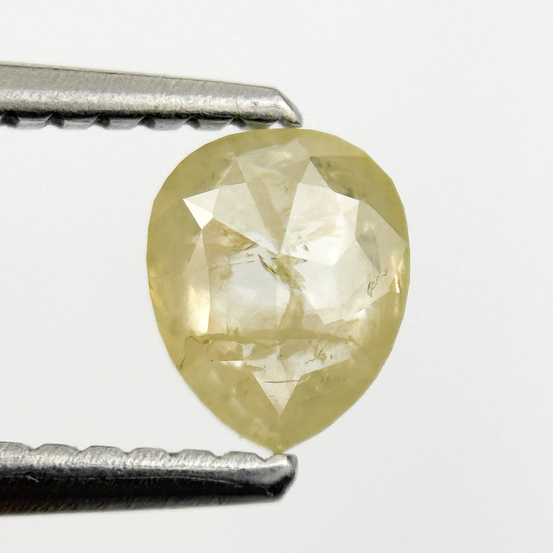 0.67 Ct Pear Rose Cut Yellow Natural Salt and Pepper Diamond