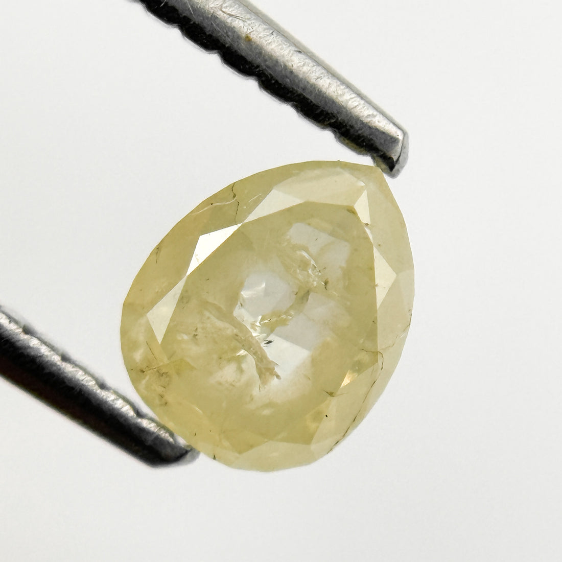 0.67 Ct Pear Rose Cut Yellow Natural Salt and Pepper Diamond