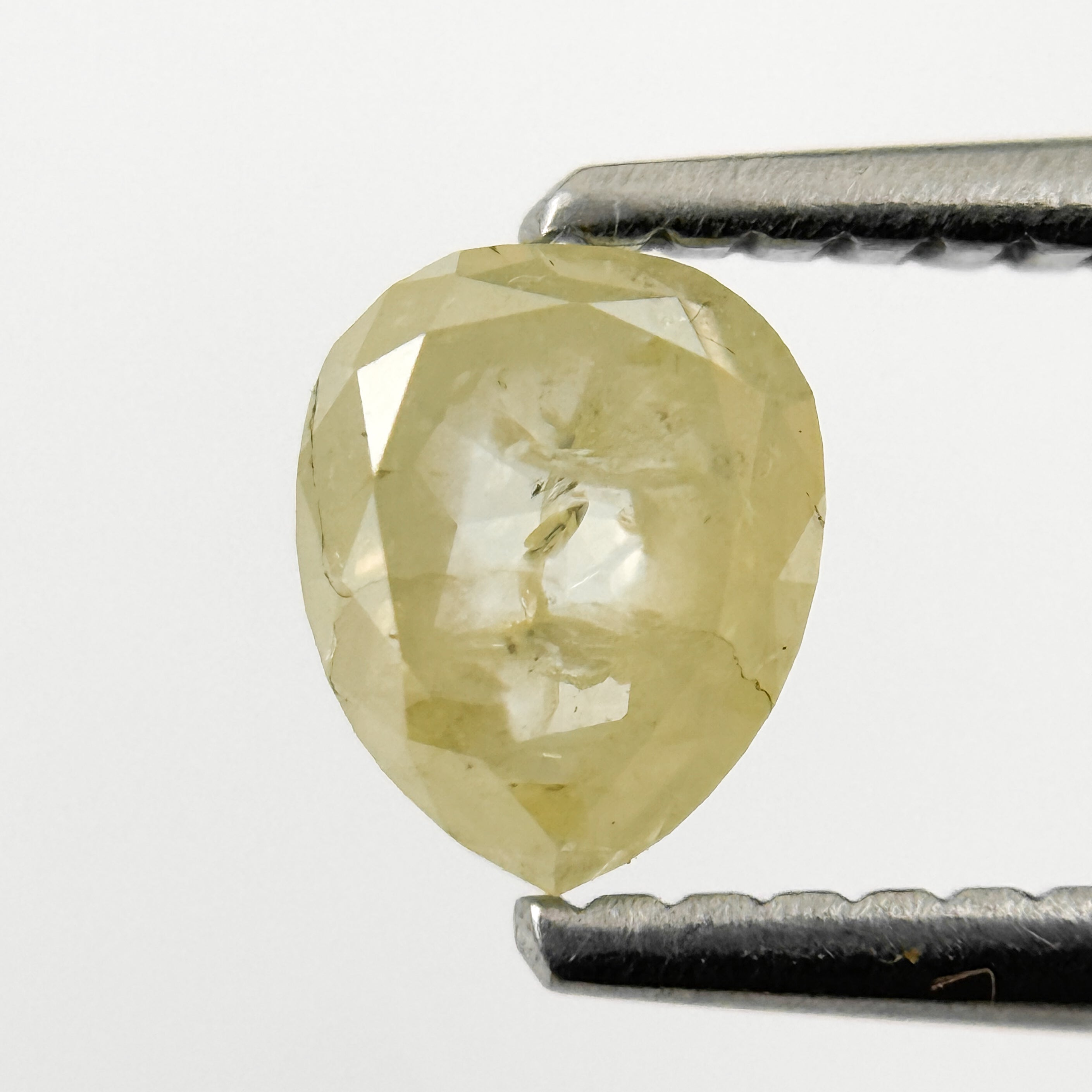 0.67 Ct Pear Rose Cut Yellow Natural Salt and Pepper Diamond