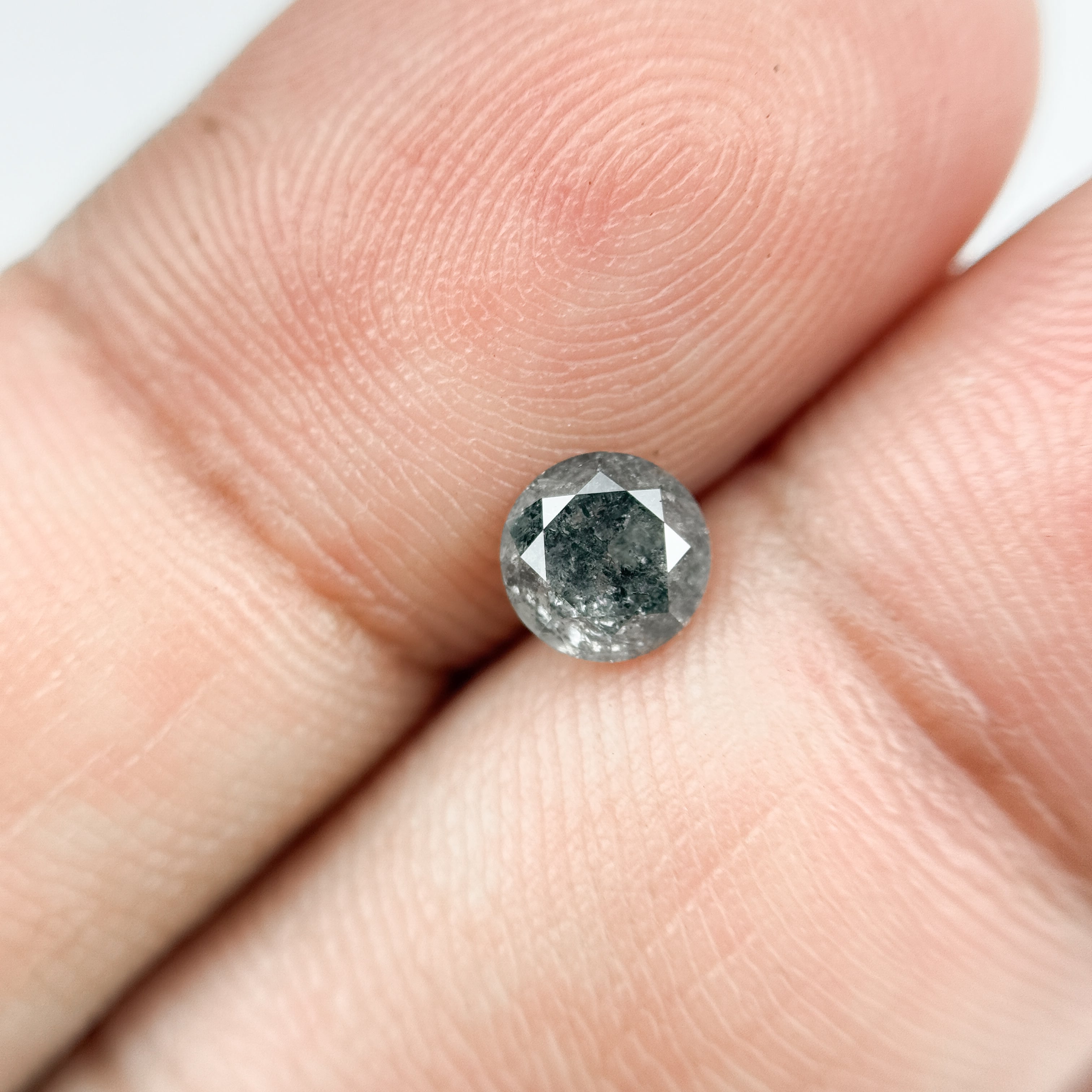 0.69 Ct Round Brilliant Cut Grey Natural Salt and Pepper Diamond