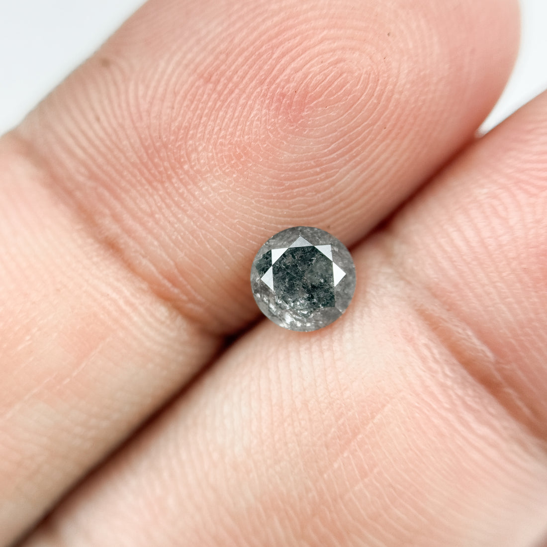0.69 Ct Round Brilliant Cut Grey Natural Salt and Pepper Diamond