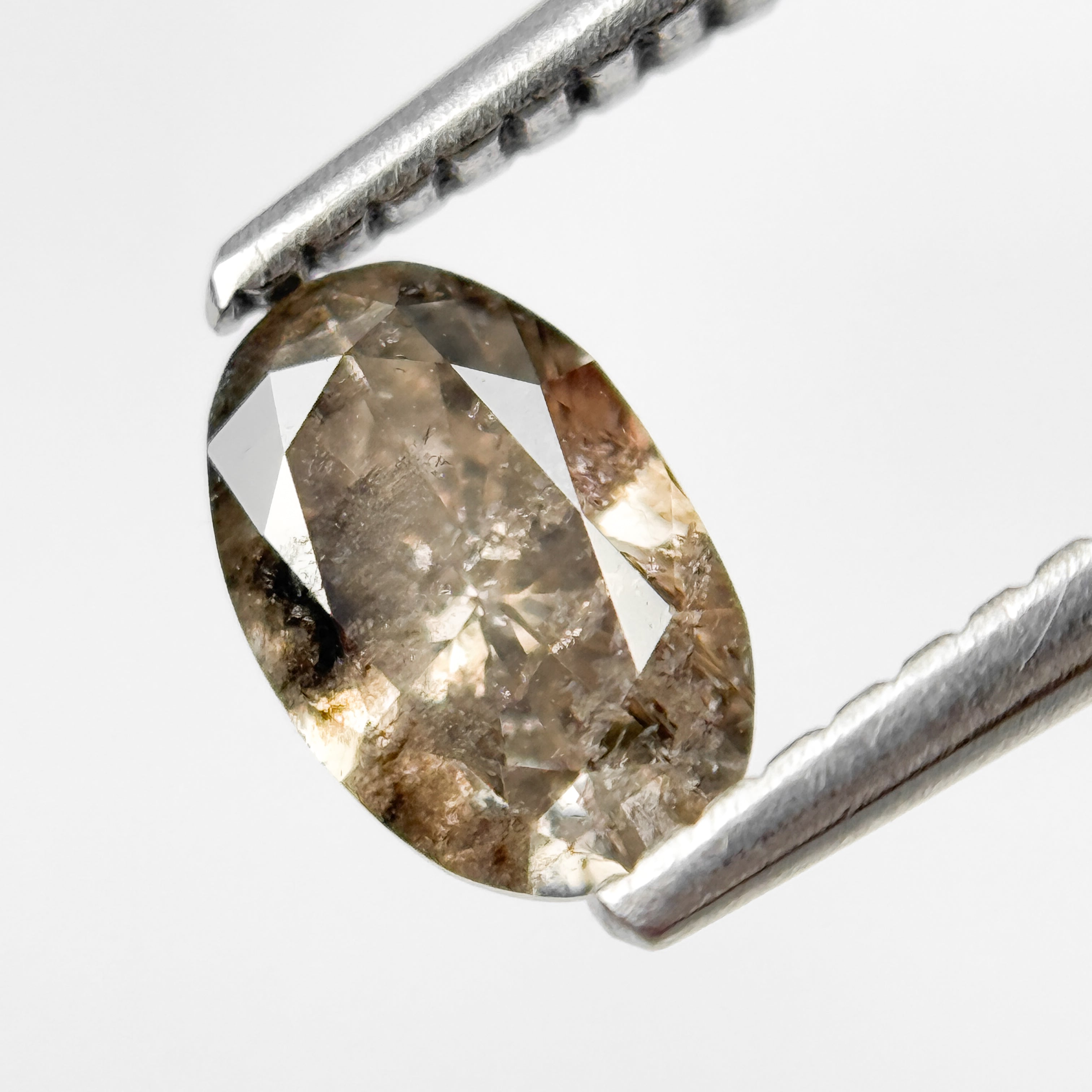 0.70 Ct Oval Brilliant Cut Brown Natural Salt and Pepper Diamond