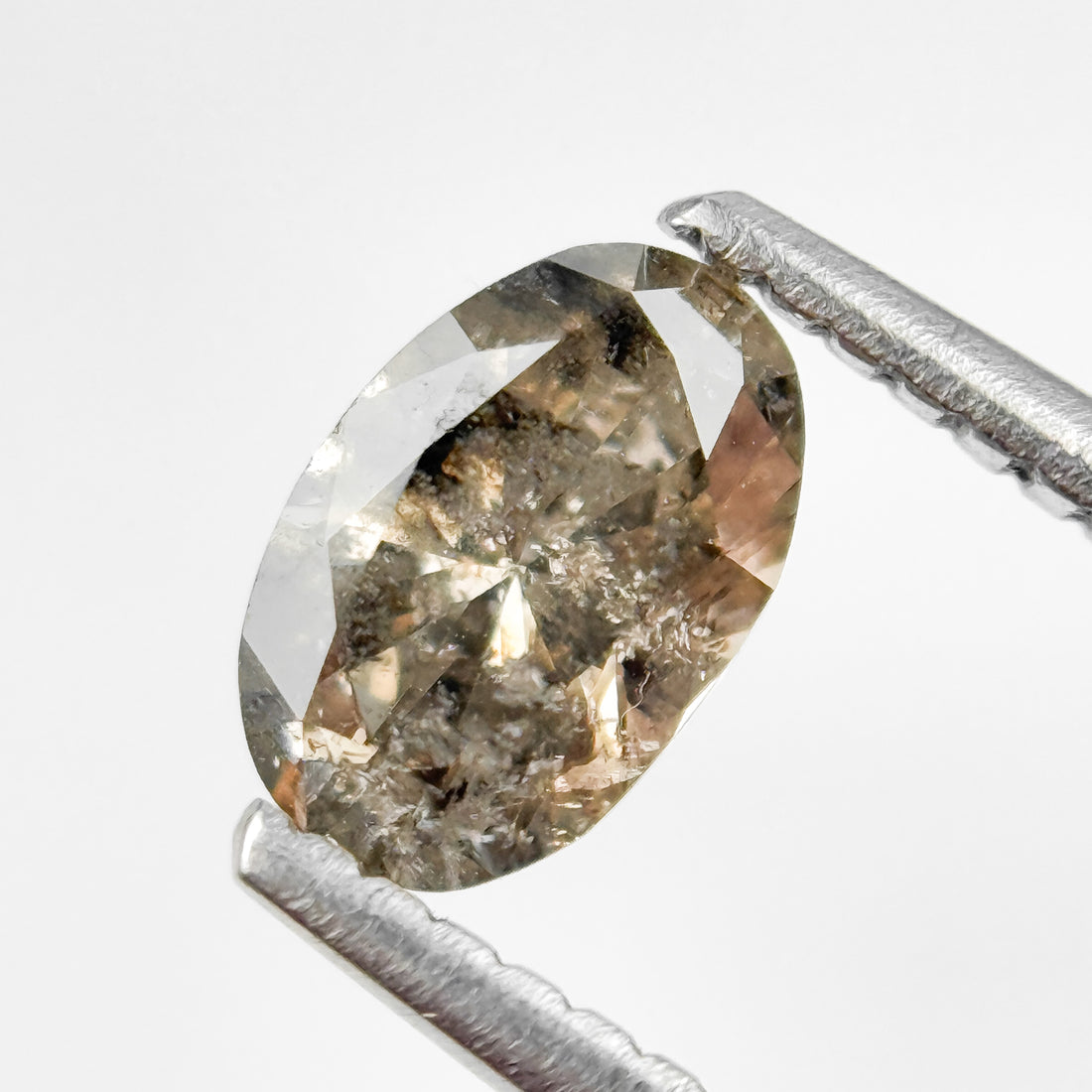0.70 Ct Oval Brilliant Cut Brown Natural Salt and Pepper Diamond