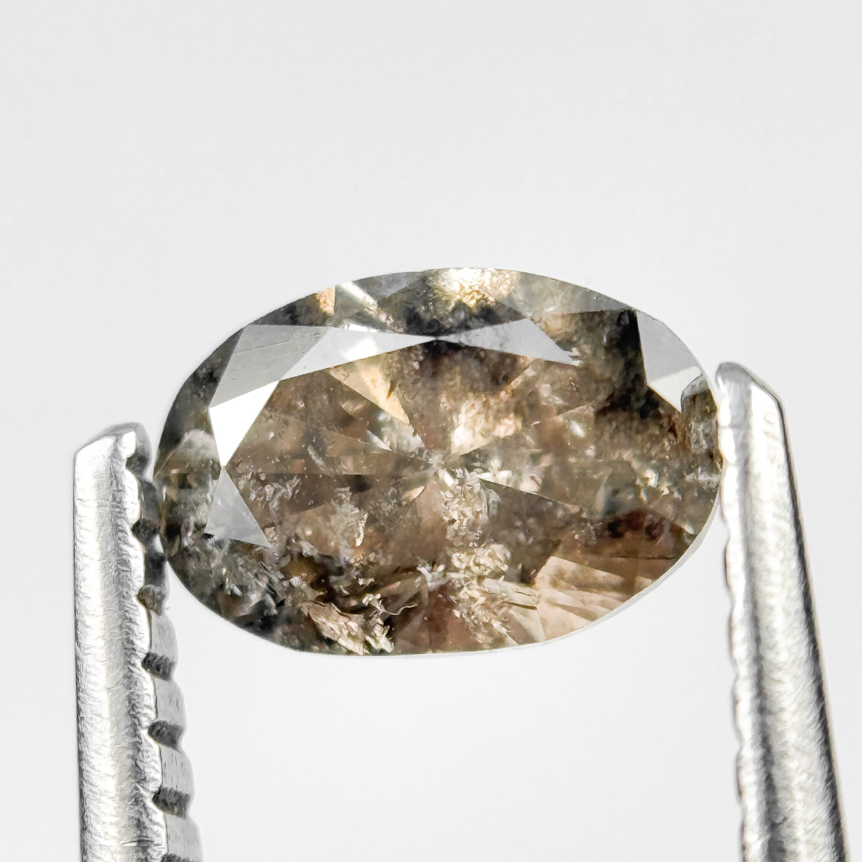 0.70 Ct Oval Brilliant Cut Brown Natural Salt and Pepper Diamond
