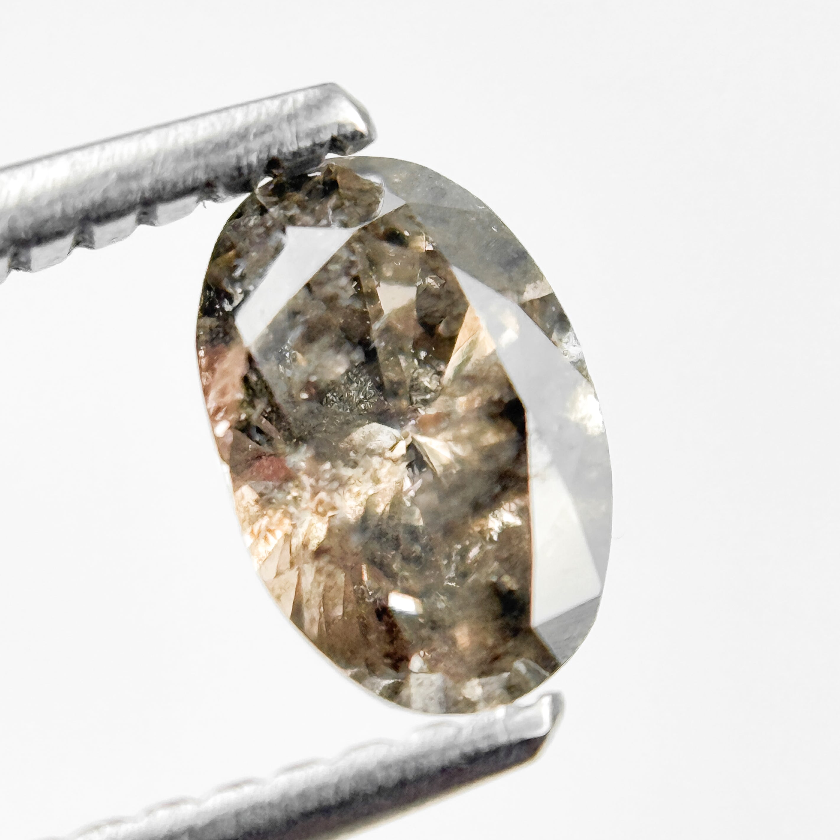 0.70 Ct Oval Brilliant Cut Brown Natural Salt and Pepper Diamond