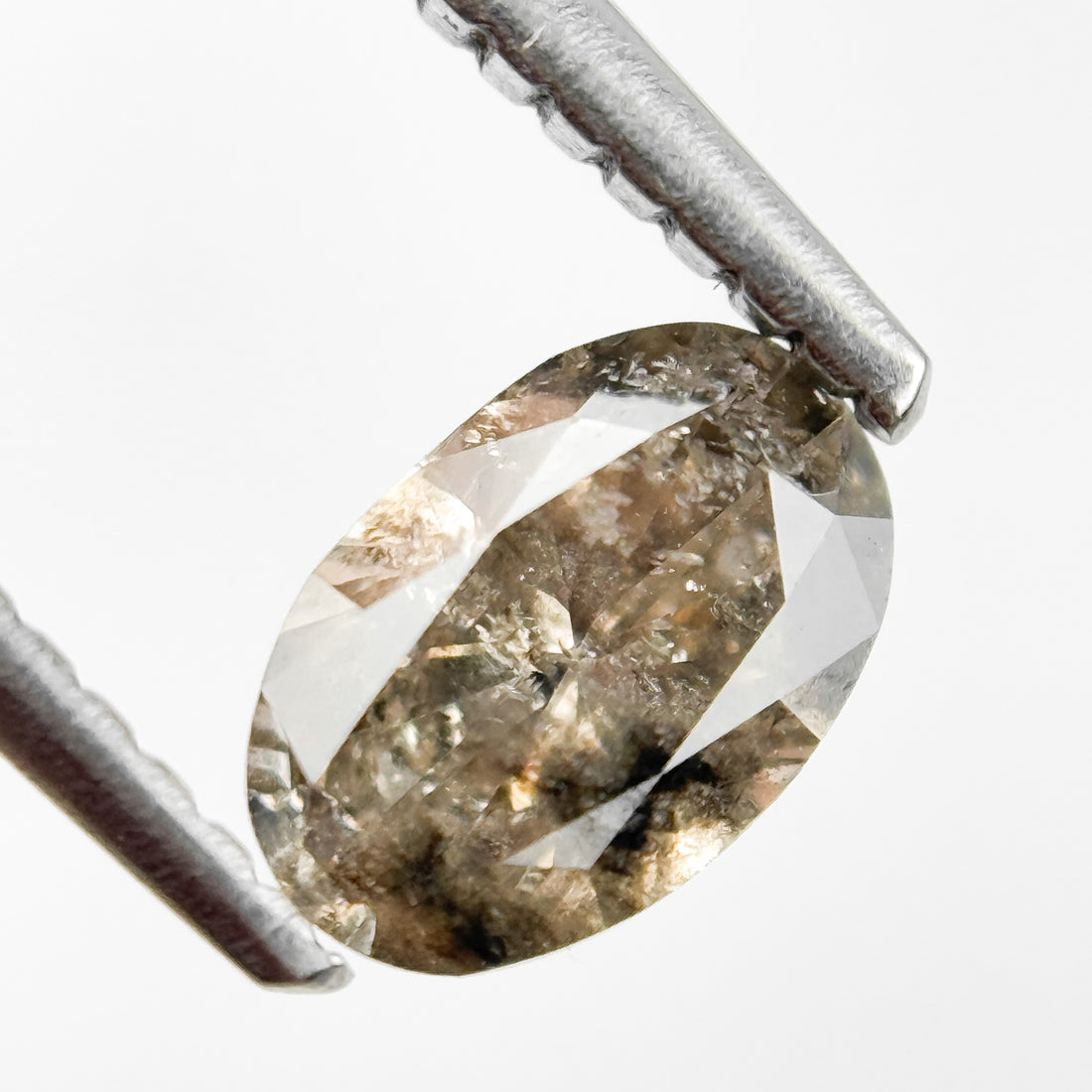 0.70 Ct Oval Brilliant Cut Brown Natural Salt and Pepper Diamond