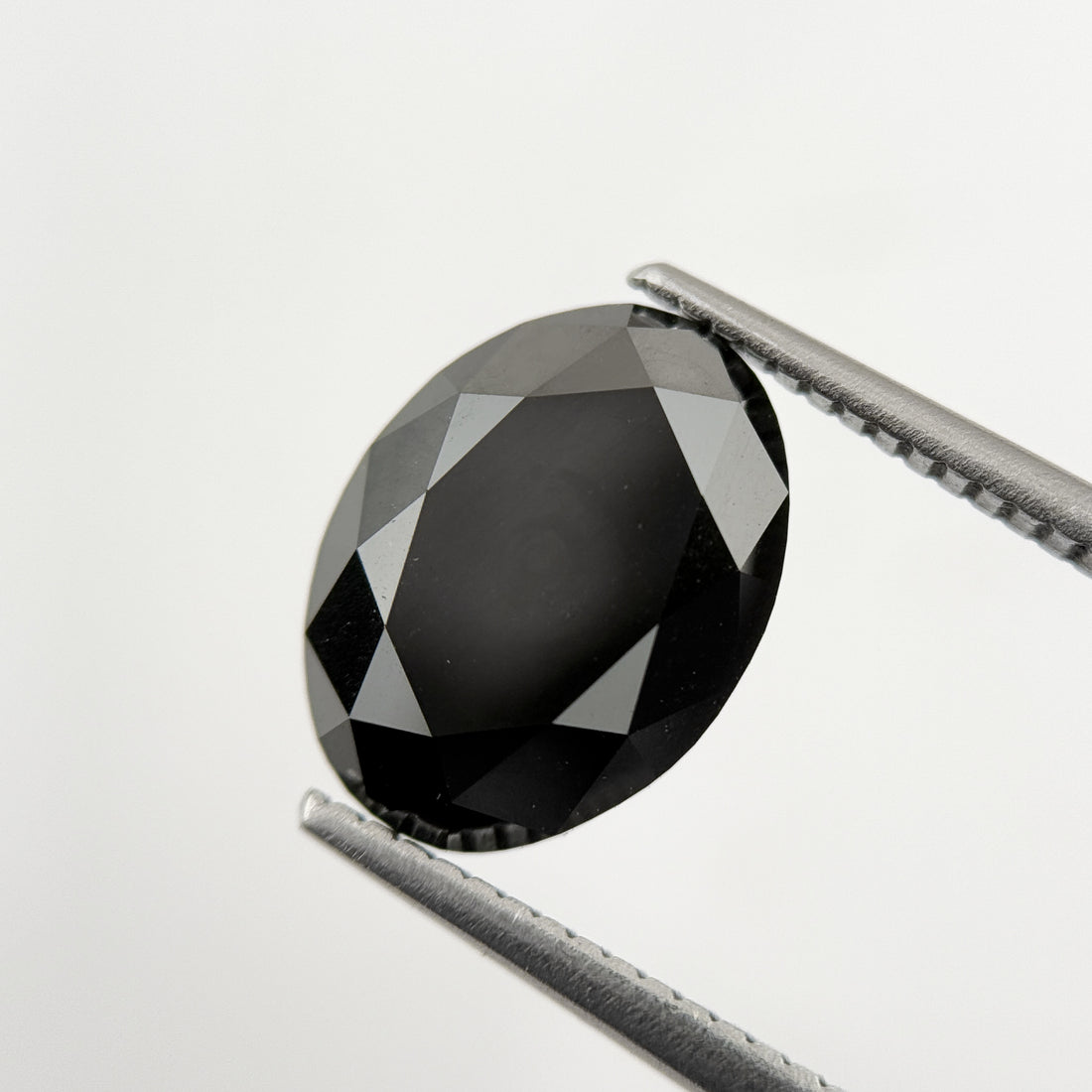 12 MM Oval Brilliant Cut Black Natural Minimal Diamond
