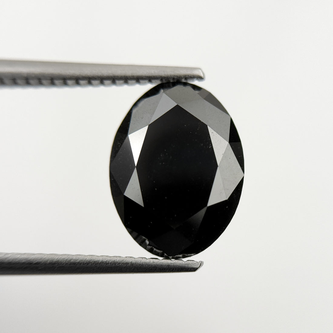 12 MM Oval Brilliant Cut Black Natural Minimal Diamond