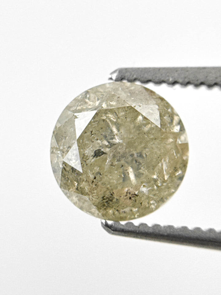 6.7 MM Round Brilliant Cut Yellow Natural Fancy Diamond