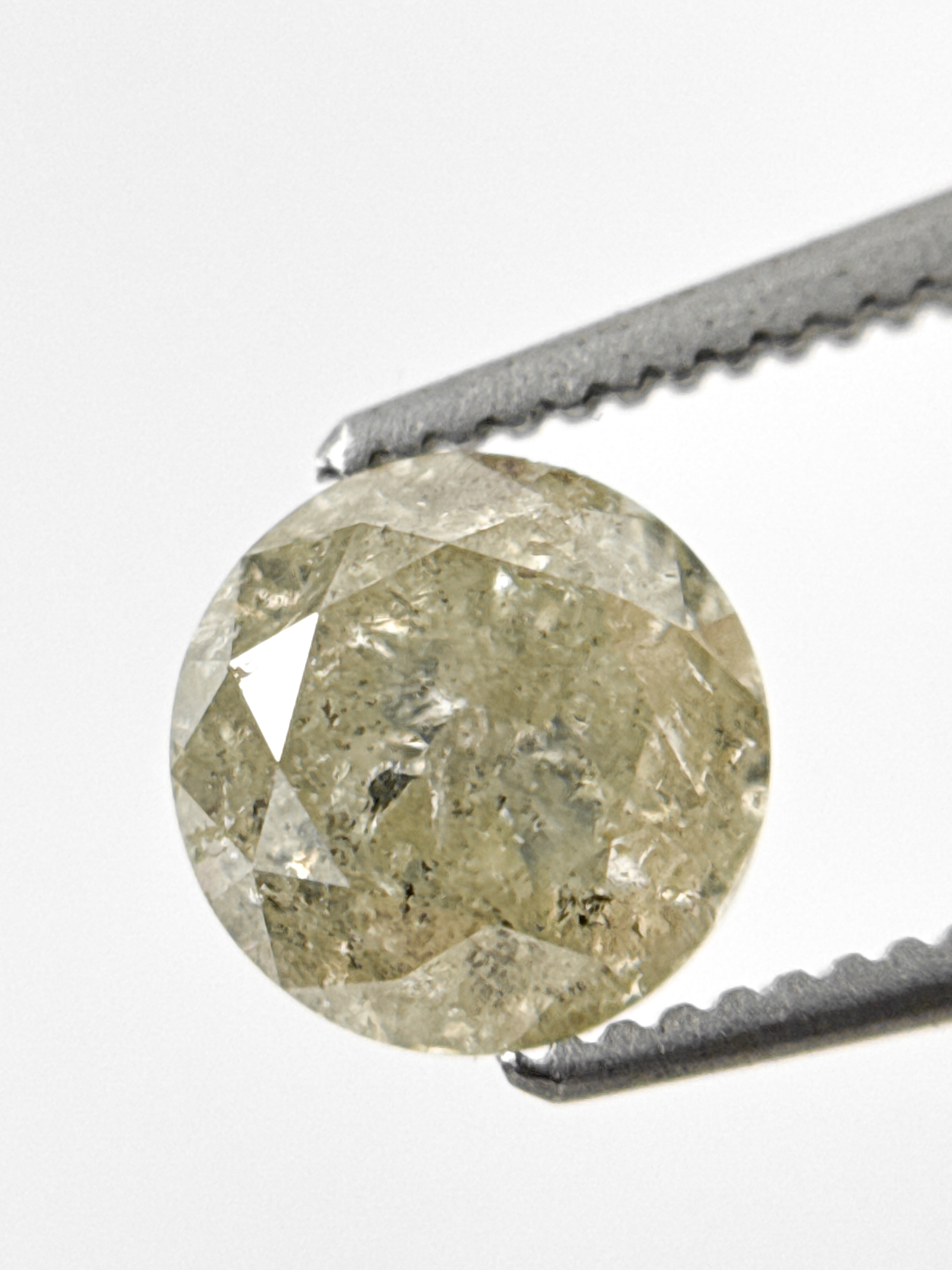 6.7 MM Round Brilliant Cut Yellow Natural Fancy Diamond