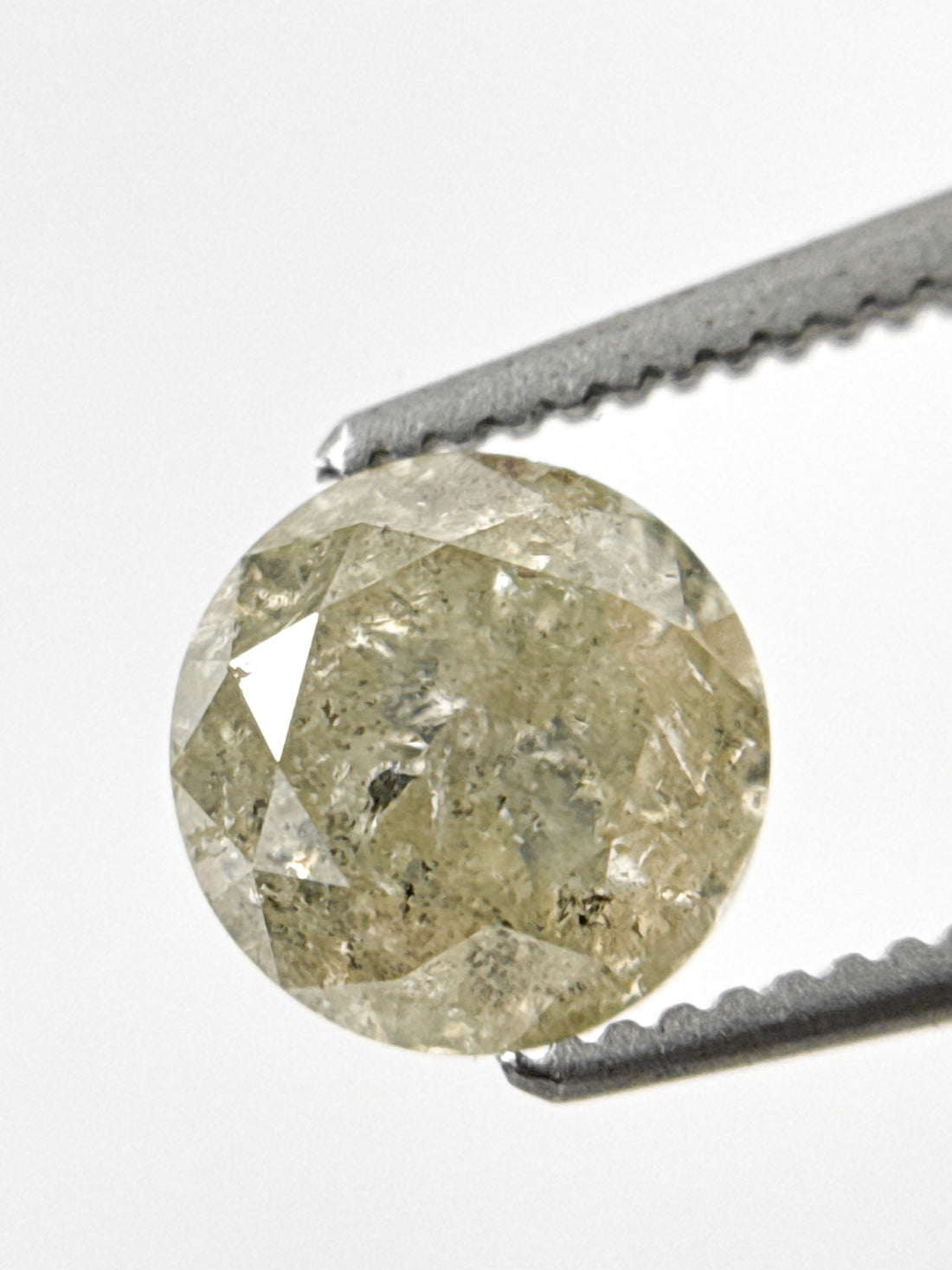 6.7 MM Round Brilliant Cut Yellow Natural Fancy Diamond