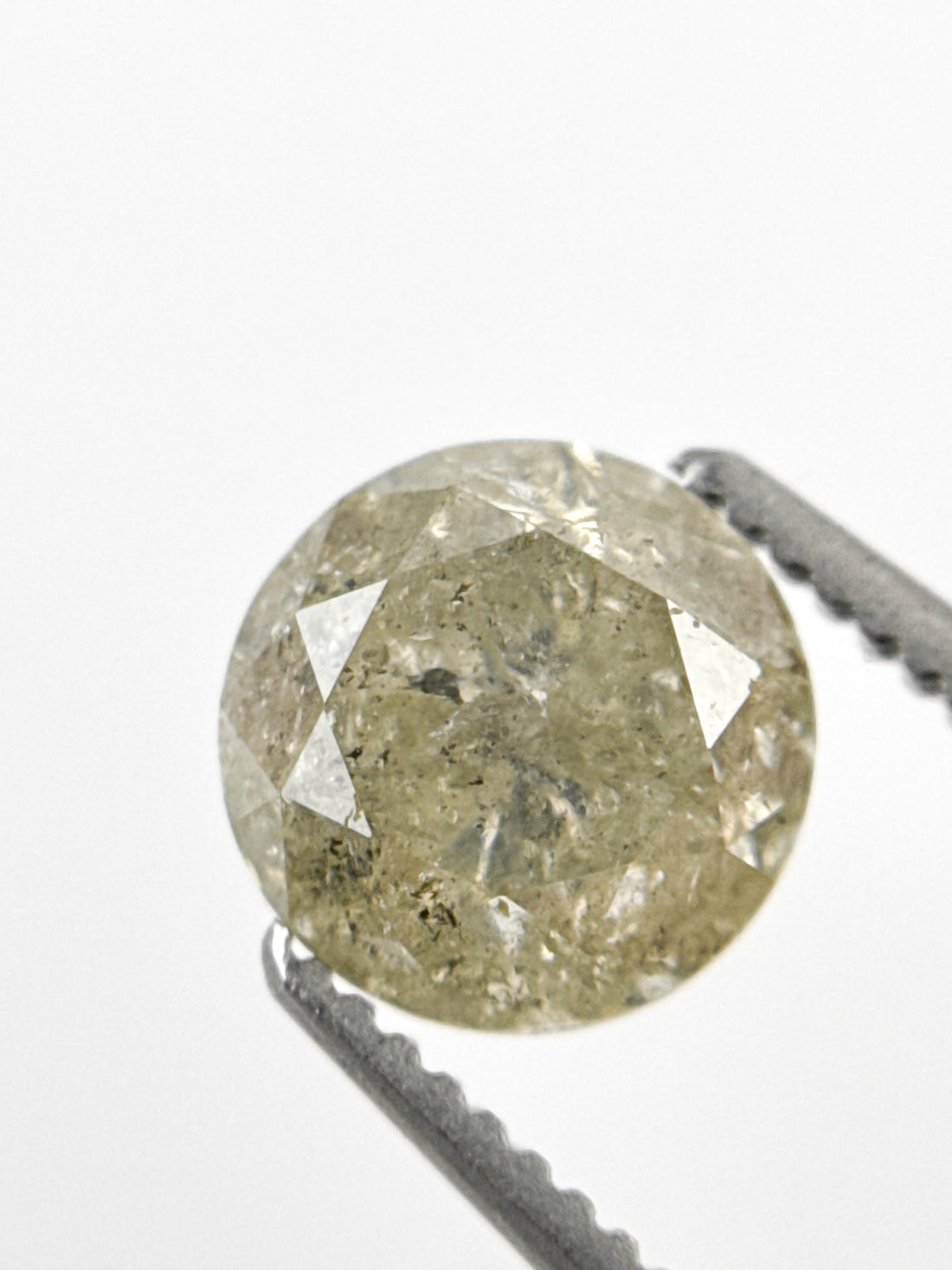 6.7 MM Round Brilliant Cut Yellow Natural Fancy Diamond