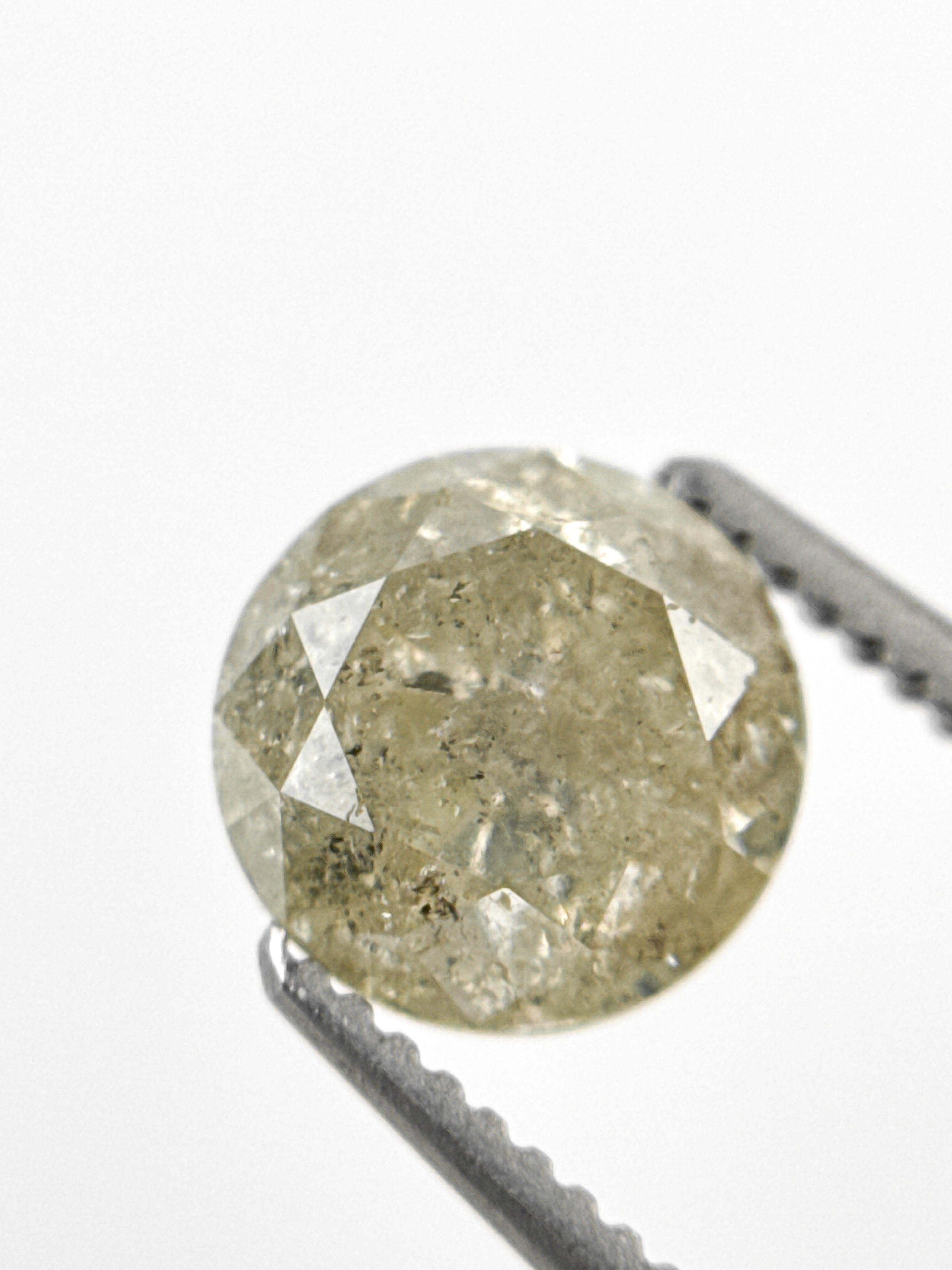 6.7 MM Round Brilliant Cut Yellow Natural Fancy Diamond