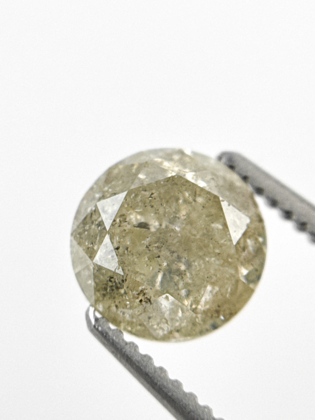 6.7 MM Round Brilliant Cut Yellow Natural Fancy Diamond