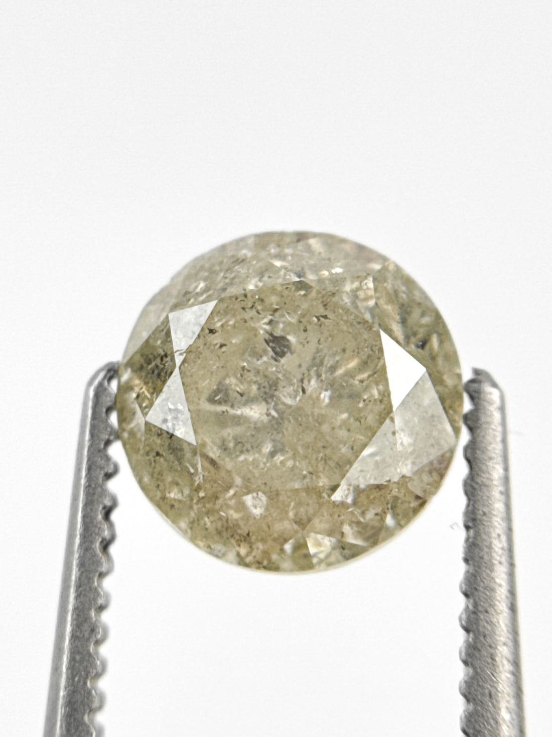6.7 MM Round Brilliant Cut Yellow Natural Fancy Diamond