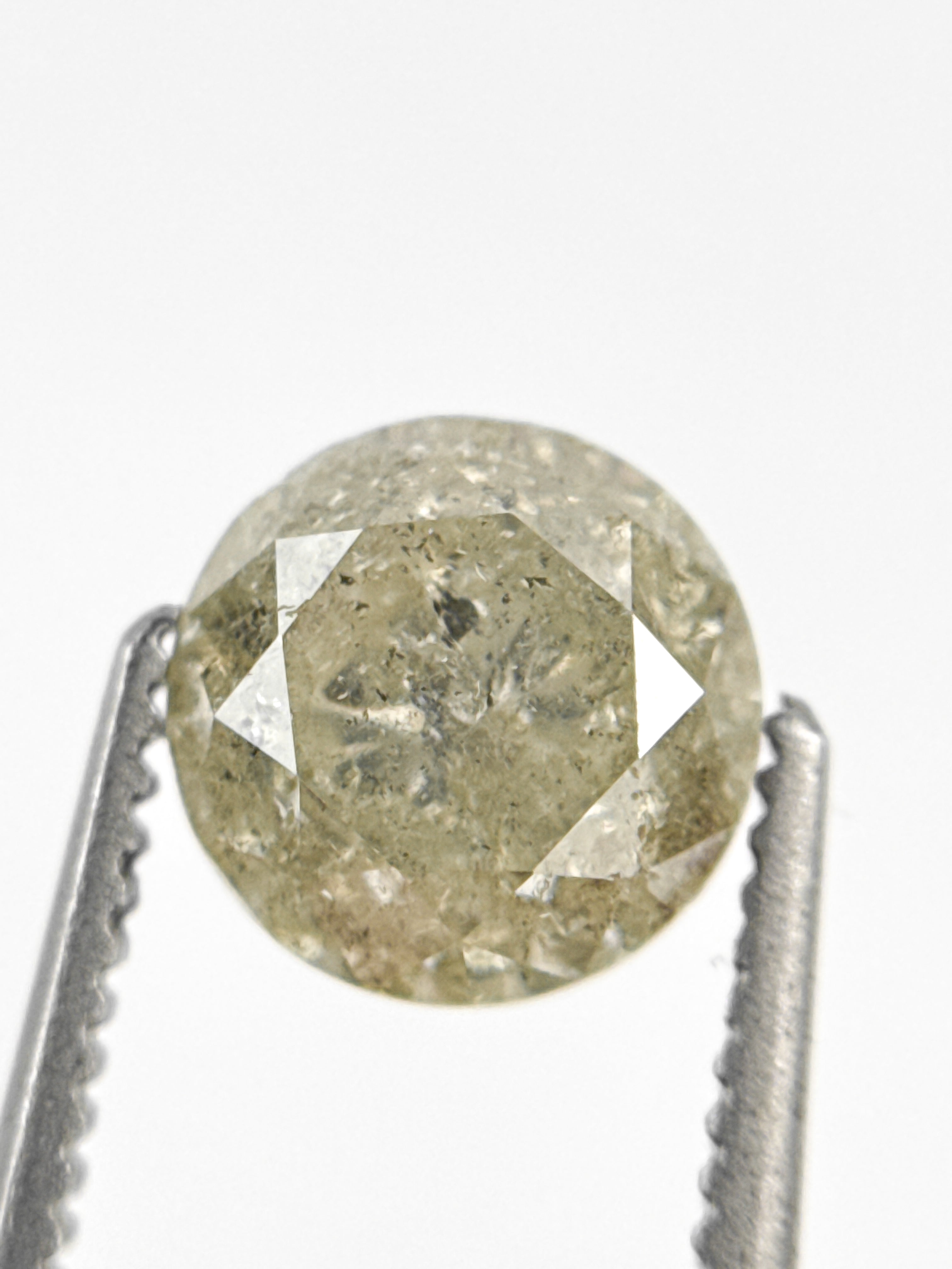 6.7 MM Round Brilliant Cut Yellow Natural Fancy Diamond