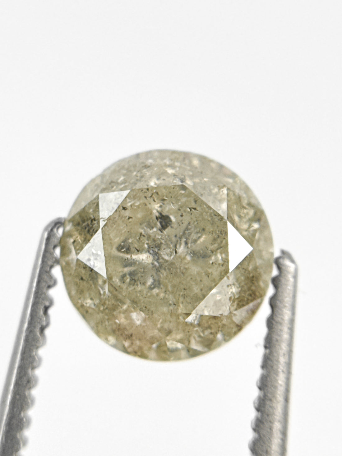 6.7 MM Round Brilliant Cut Yellow Natural Fancy Diamond