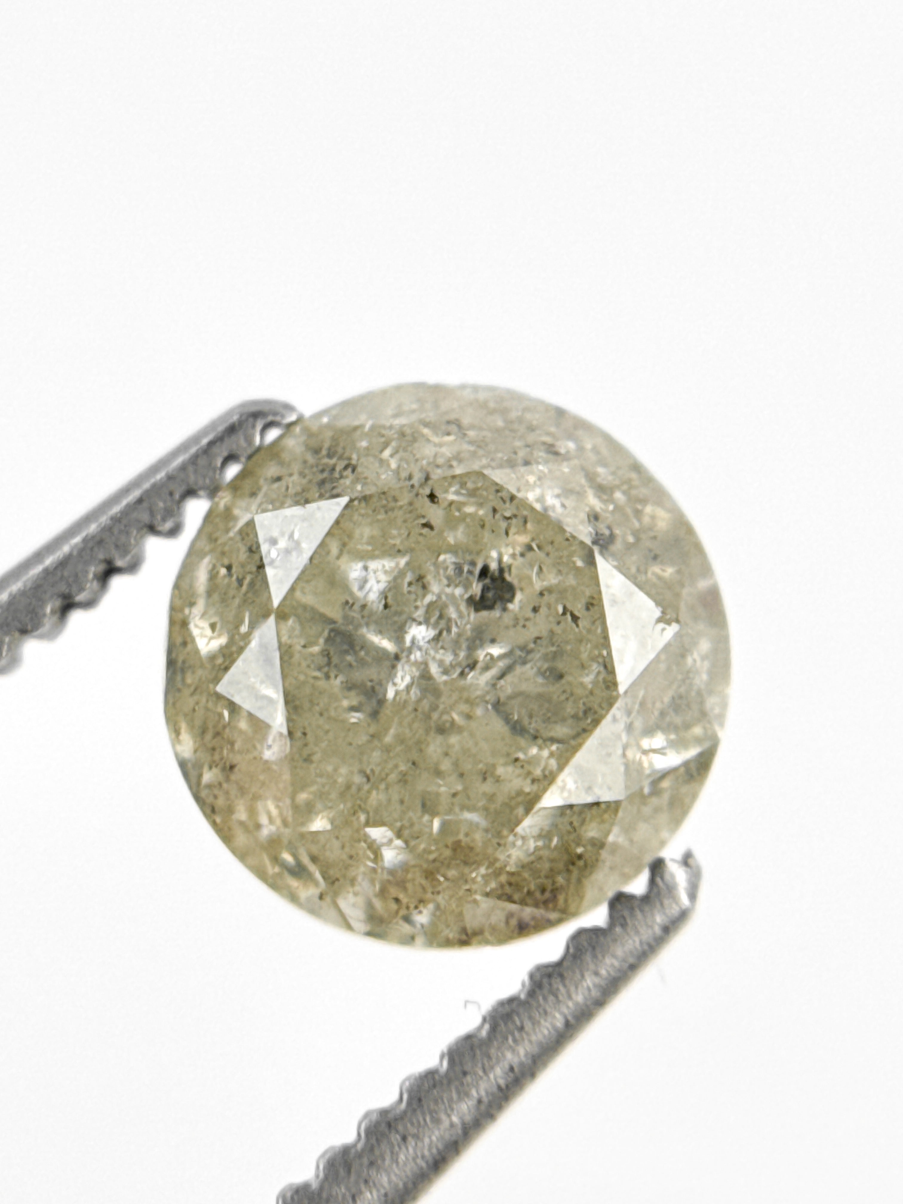 6.7 MM Round Brilliant Cut Yellow Natural Fancy Diamond