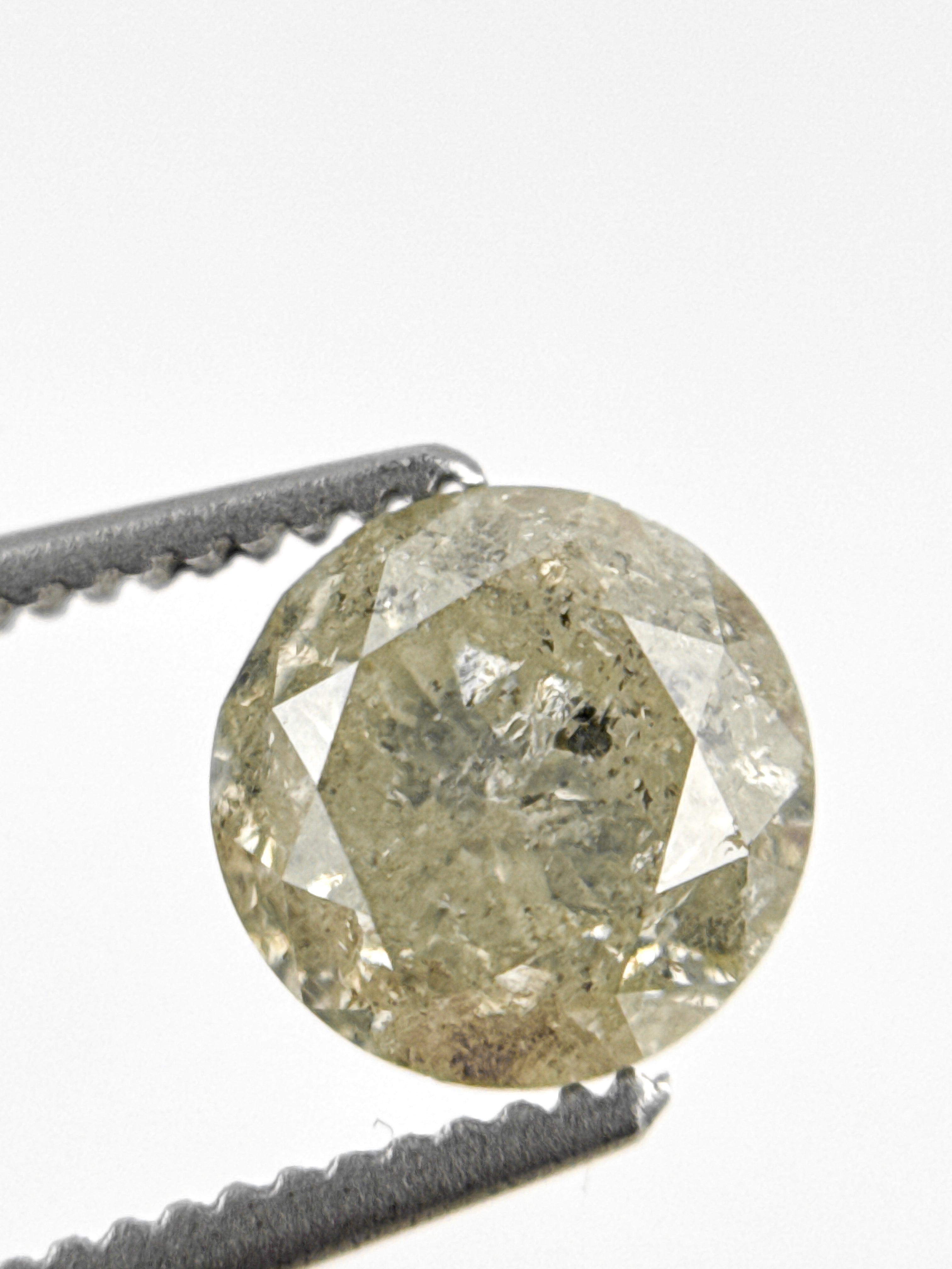 6.7 MM Round Brilliant Cut Yellow Natural Fancy Diamond