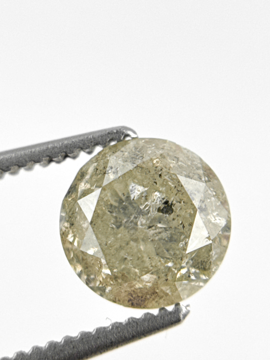 6.7 MM Round Brilliant Cut Yellow Natural Fancy Diamond