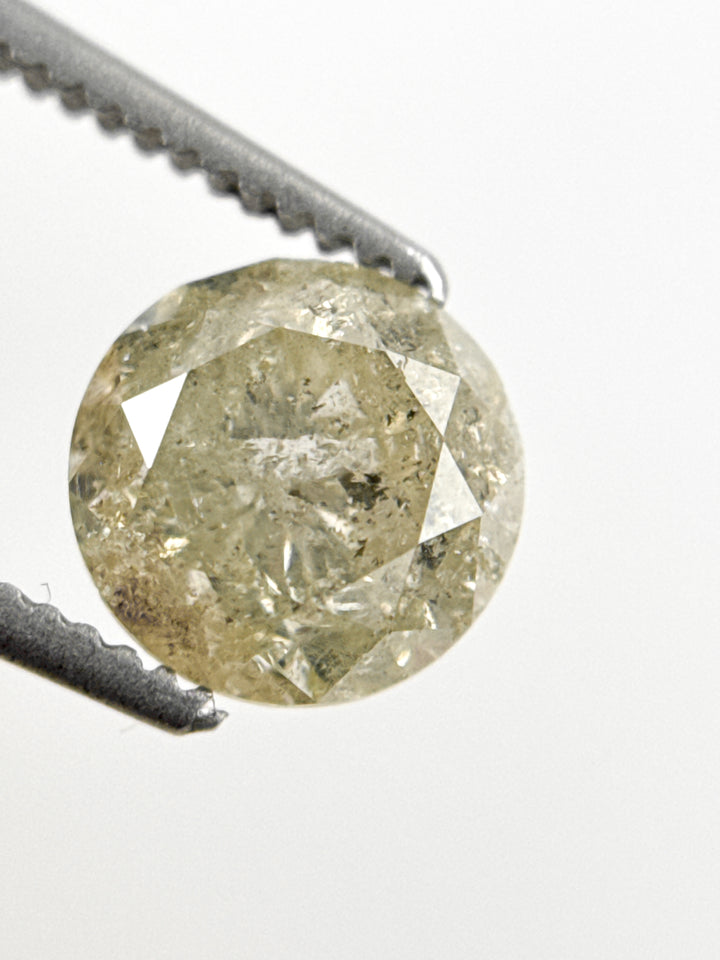 6.7 MM Round Brilliant Cut Yellow Natural Fancy Diamond