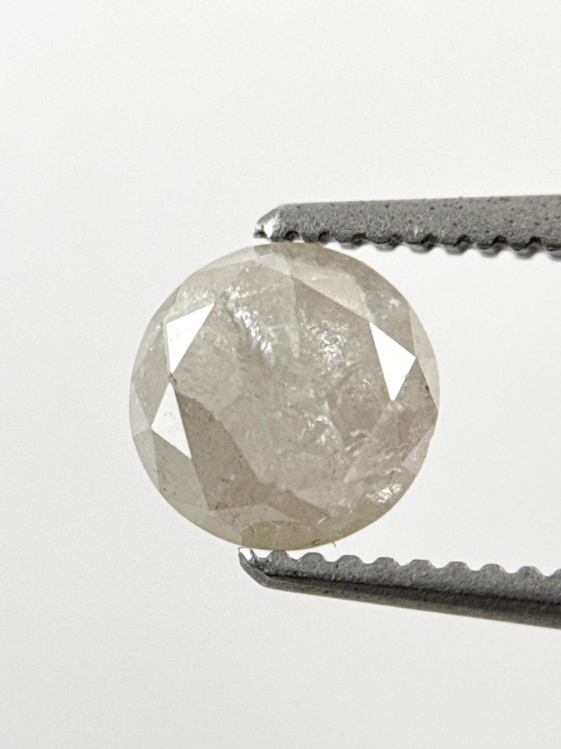 0.87 Ct Round Brilliant Cut Milky White Natural Inclusion Diamond