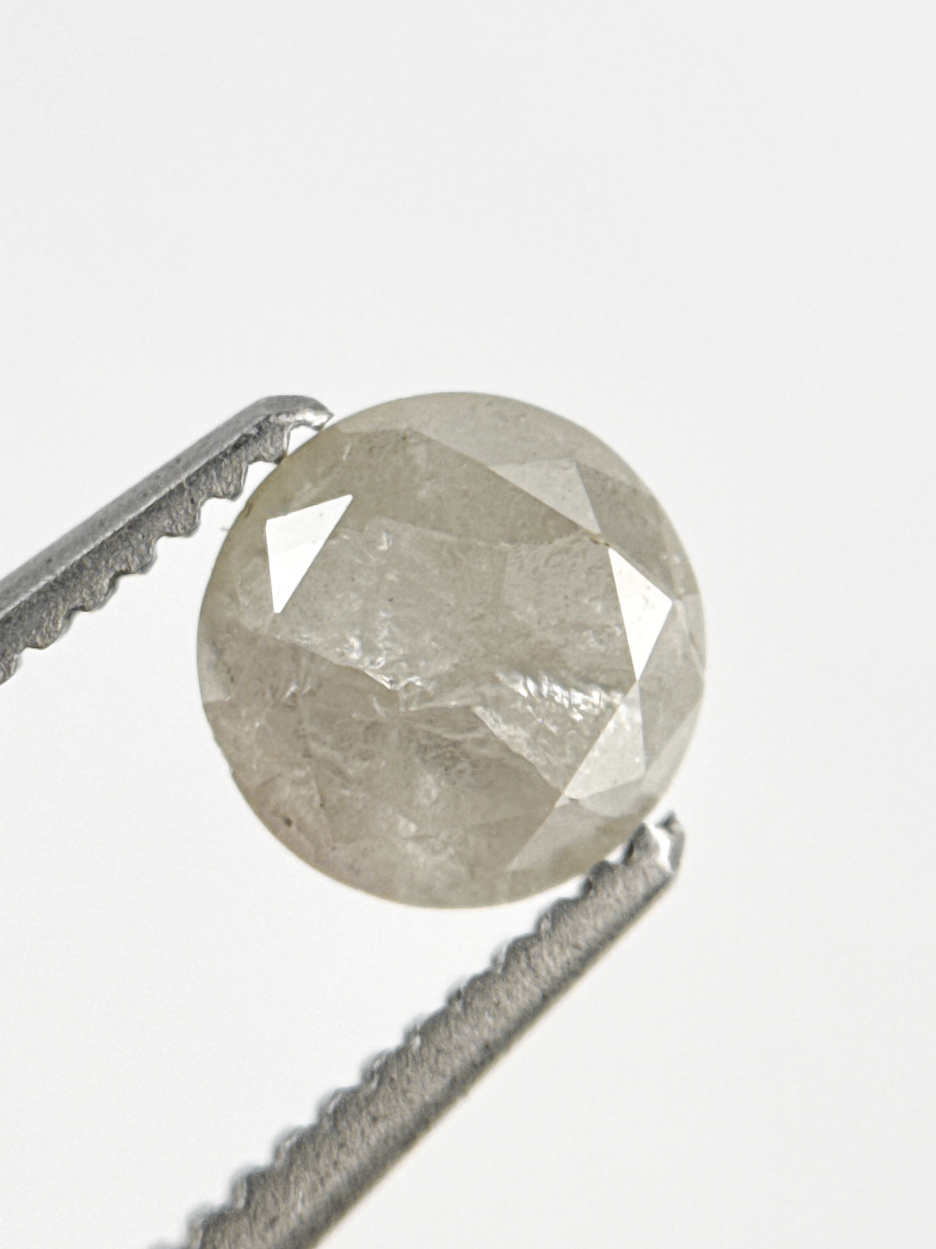 0.87 Ct Round Brilliant Cut Milky White Natural Inclusion Diamond