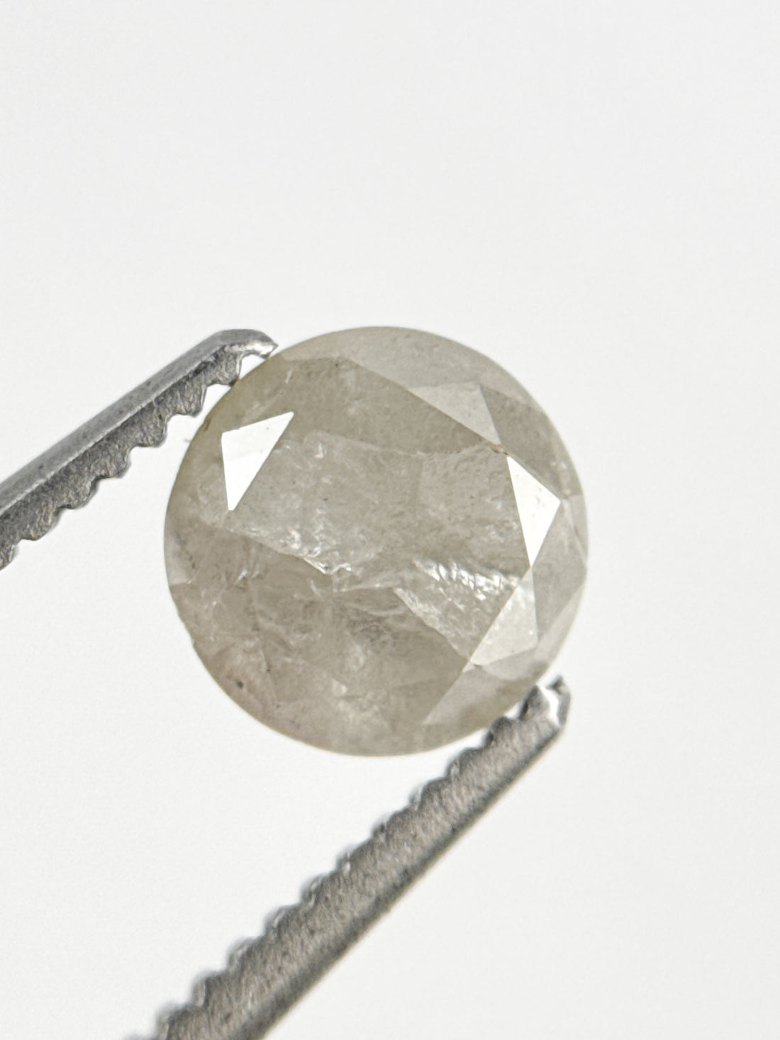 0.87 Ct Round Brilliant Cut Milky White Natural Inclusion Diamond