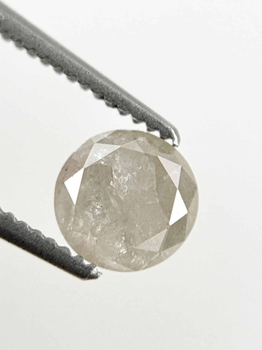 0.87 Ct Round Brilliant Cut Milky White Natural Inclusion Diamond