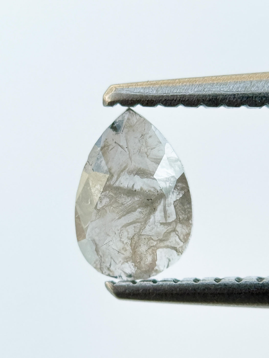 0.42 Ct Pear Rose Cut Milky White Natural Salt and Pepper Diamond