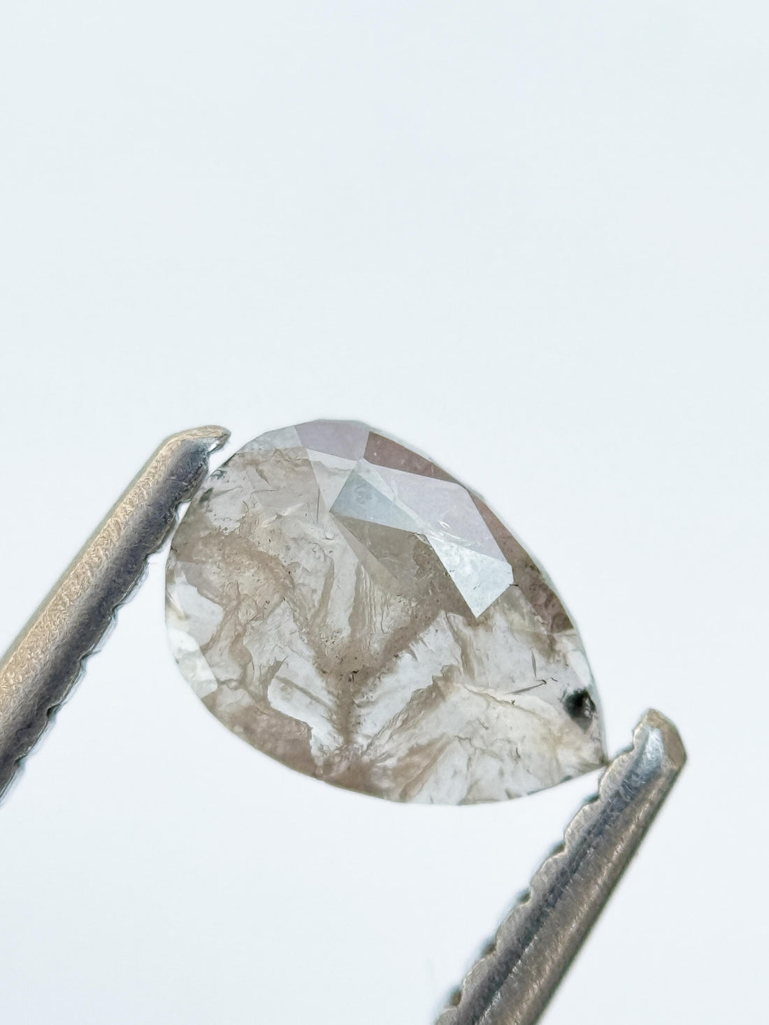 0.42 Ct Pear Rose Cut Milky White Natural Salt and Pepper Diamond