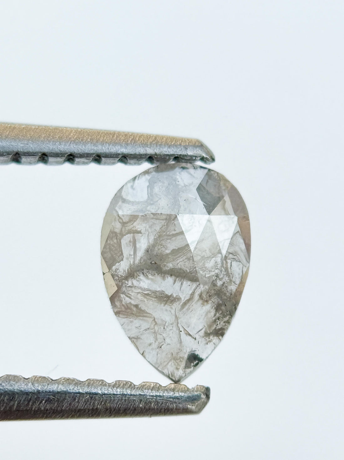 0.42 Ct Pear Rose Cut Milky White Natural Salt and Pepper Diamond