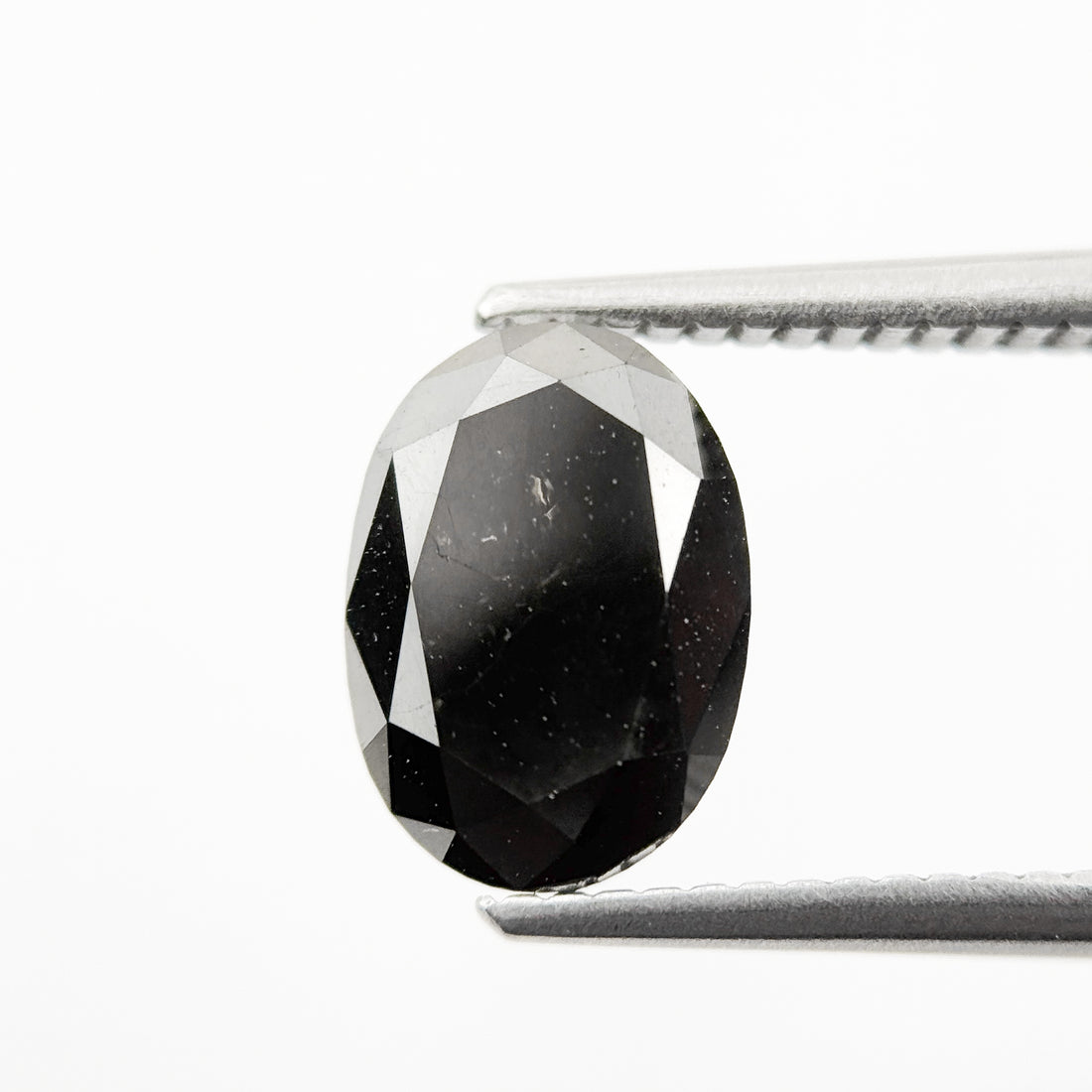 9.9 MM Oval Brilliant Cut Black Natural Fancy Diamond