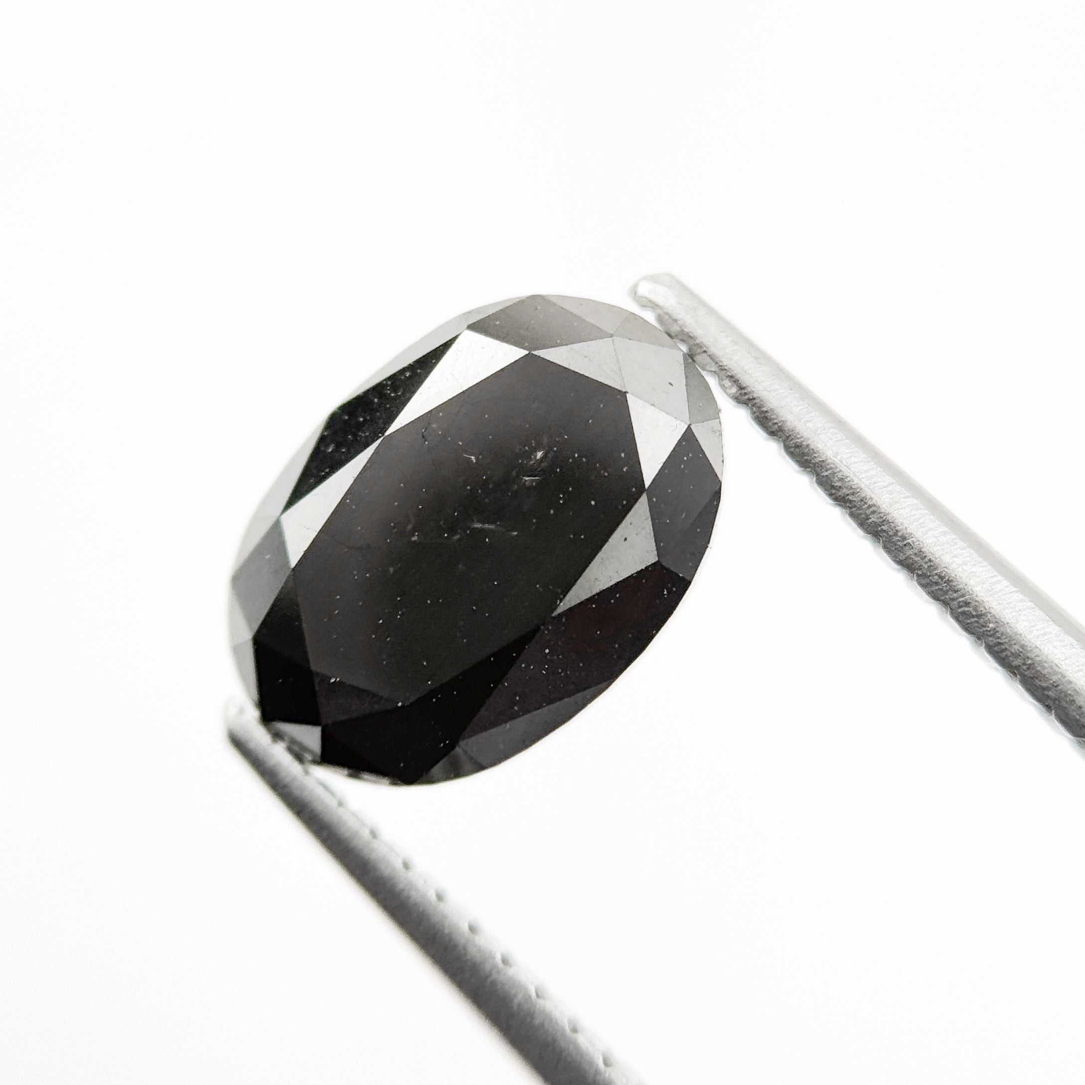 9.9 MM Oval Brilliant Cut Black Natural Fancy Diamond